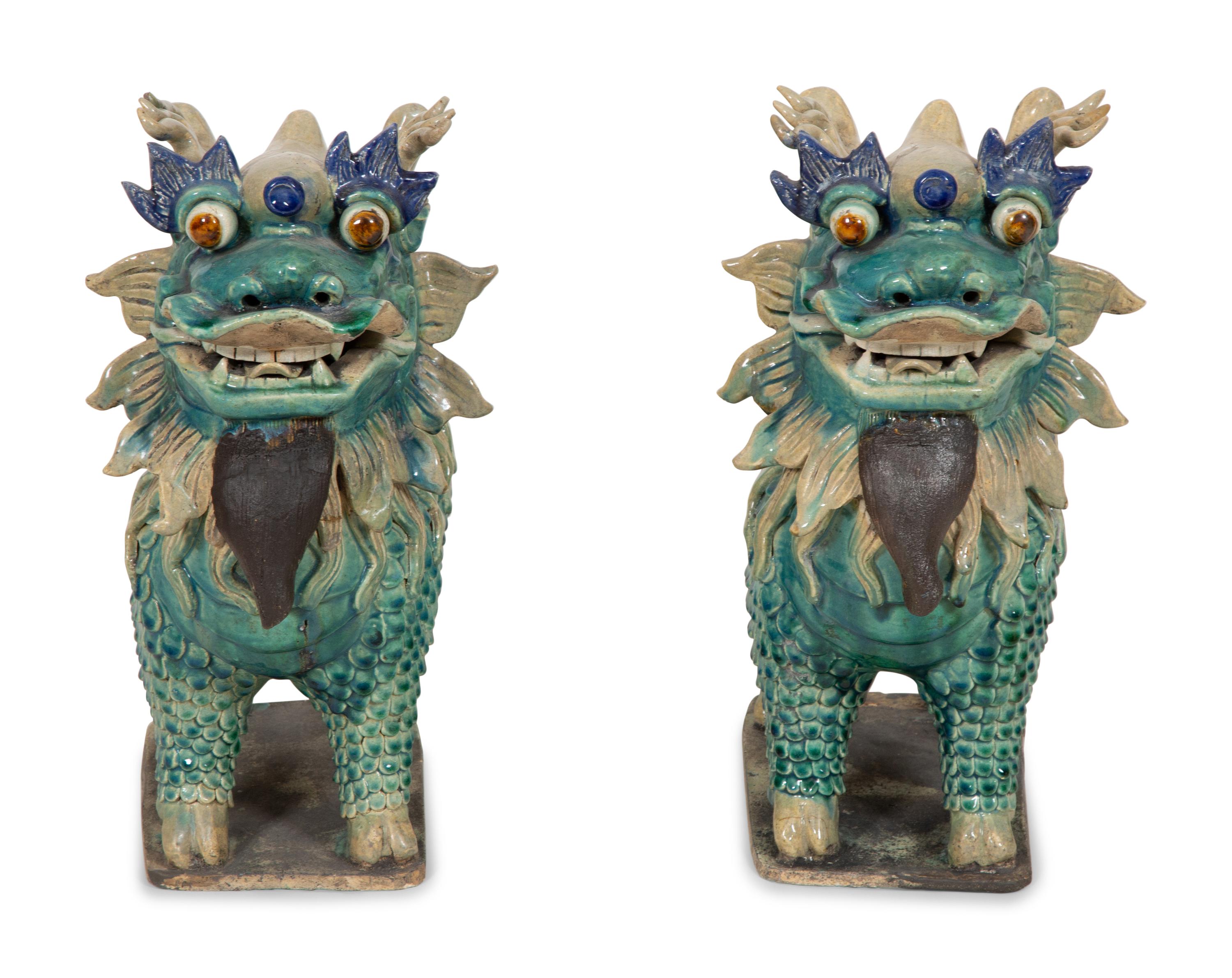A Pair of Chinese Glazed Ceramic Dragons