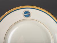 [TRANSPORTATION] - [ZEPPELIN]. Set of Deutsche Zeppelin-Reederei porcelain with dinner plates, salad plates, and sherbet glasses.