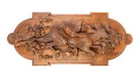 A Continental Carved Walnut Game Trophy, Height 39 1/2 inches.
