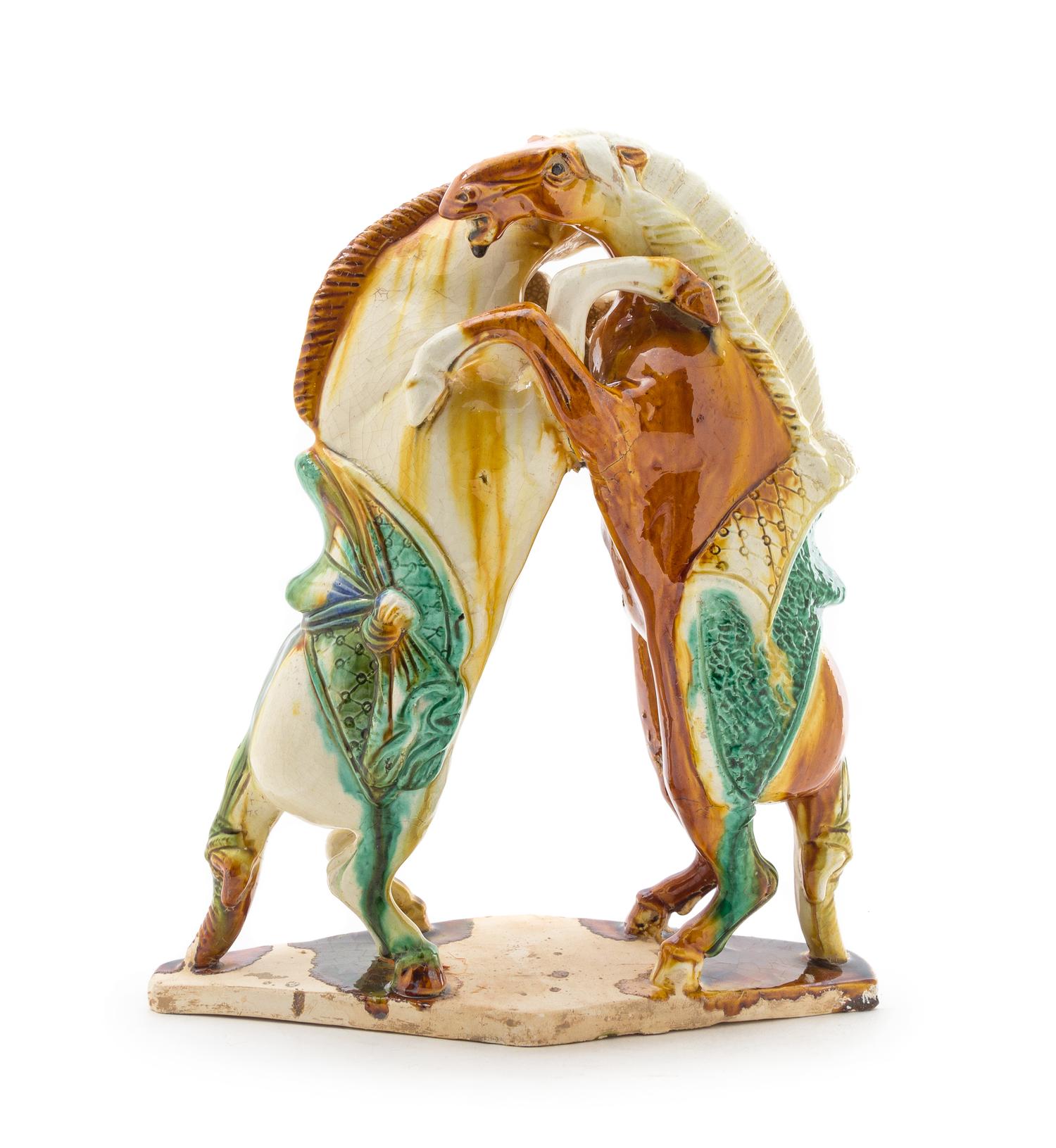 A Sancai Glazed Figural Group Height 12 inches.