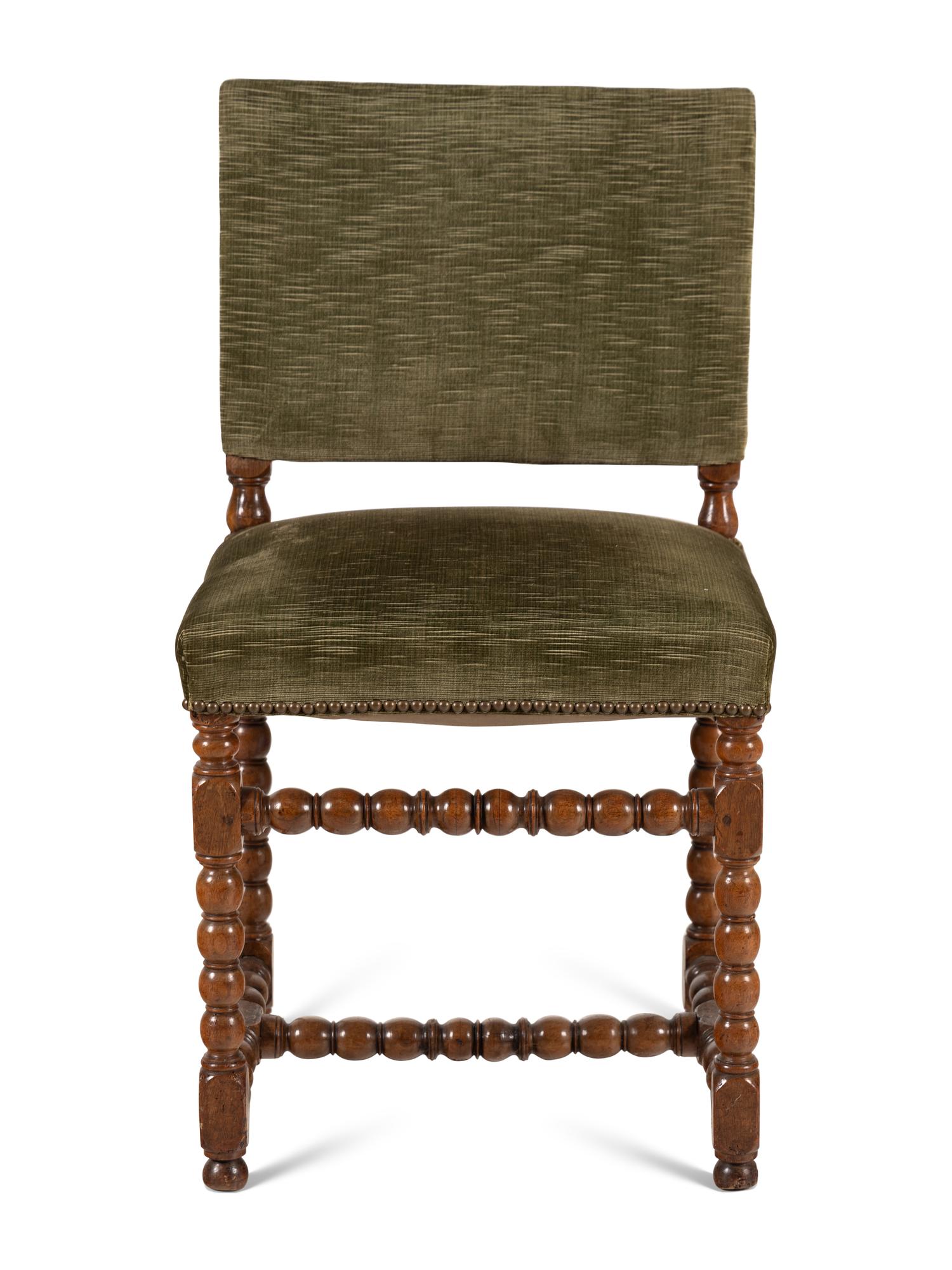 A Louis XIII Carved Walnut Side Chair