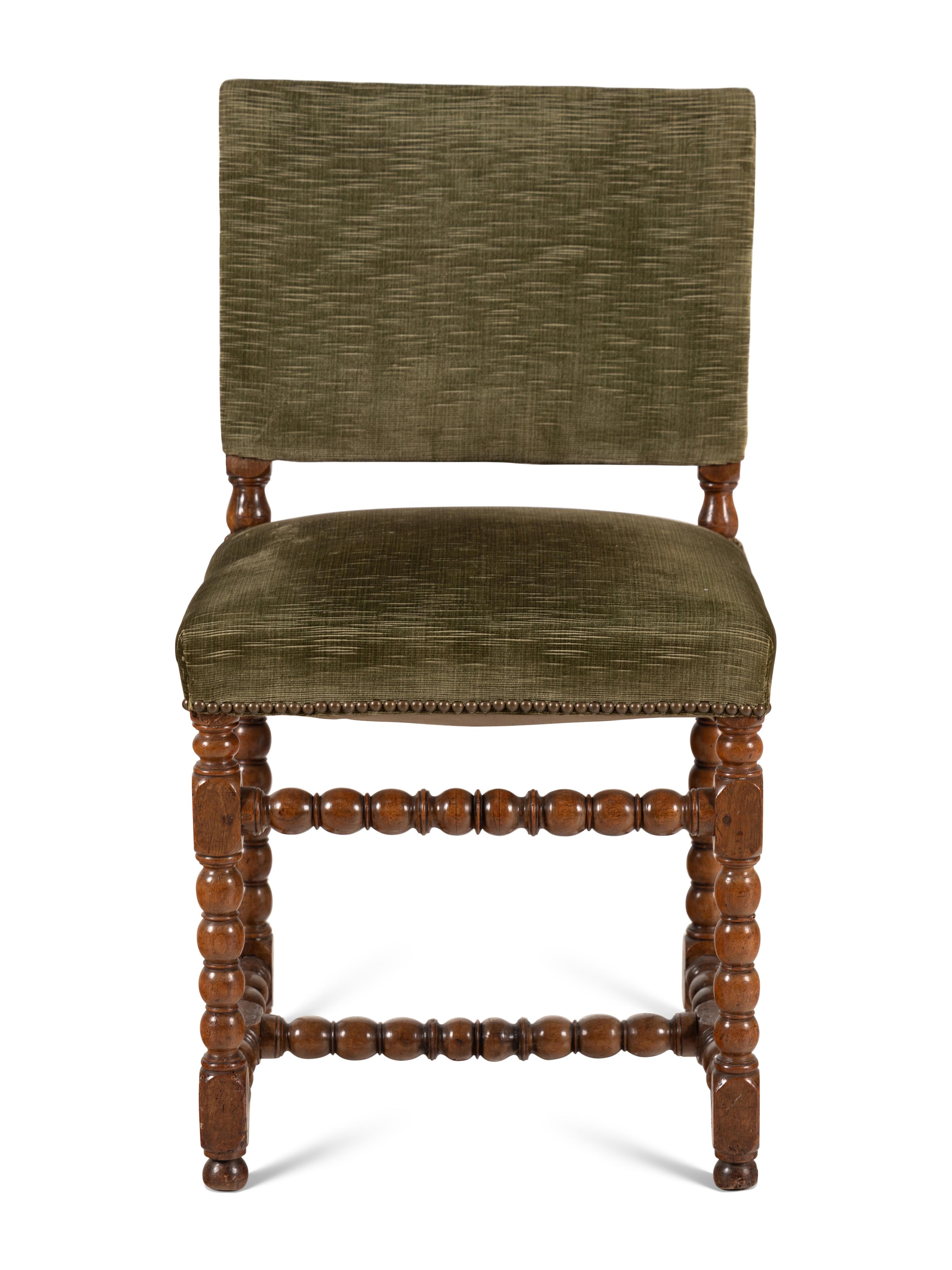 A Louis XIII Carved Walnut Side Chair