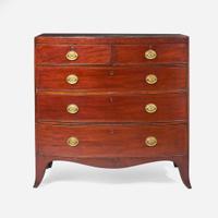 A George III bowfront mahogany chest of drawers circa 1790