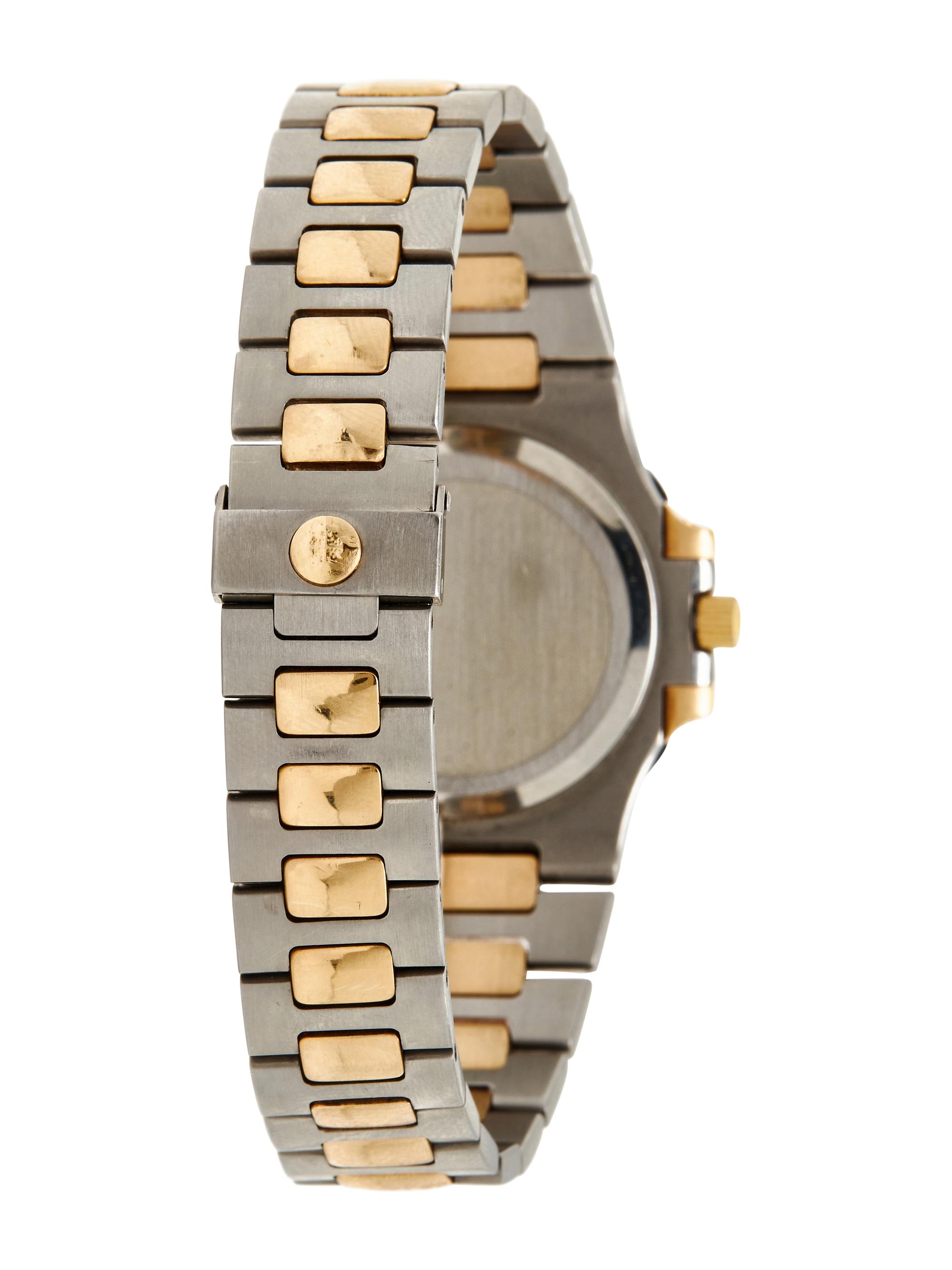 PATEK PHILIPPE, REF. 3800/1 STAINLESS STEEL AND YELLOW GOLD 'NAUTILUS' WATCH