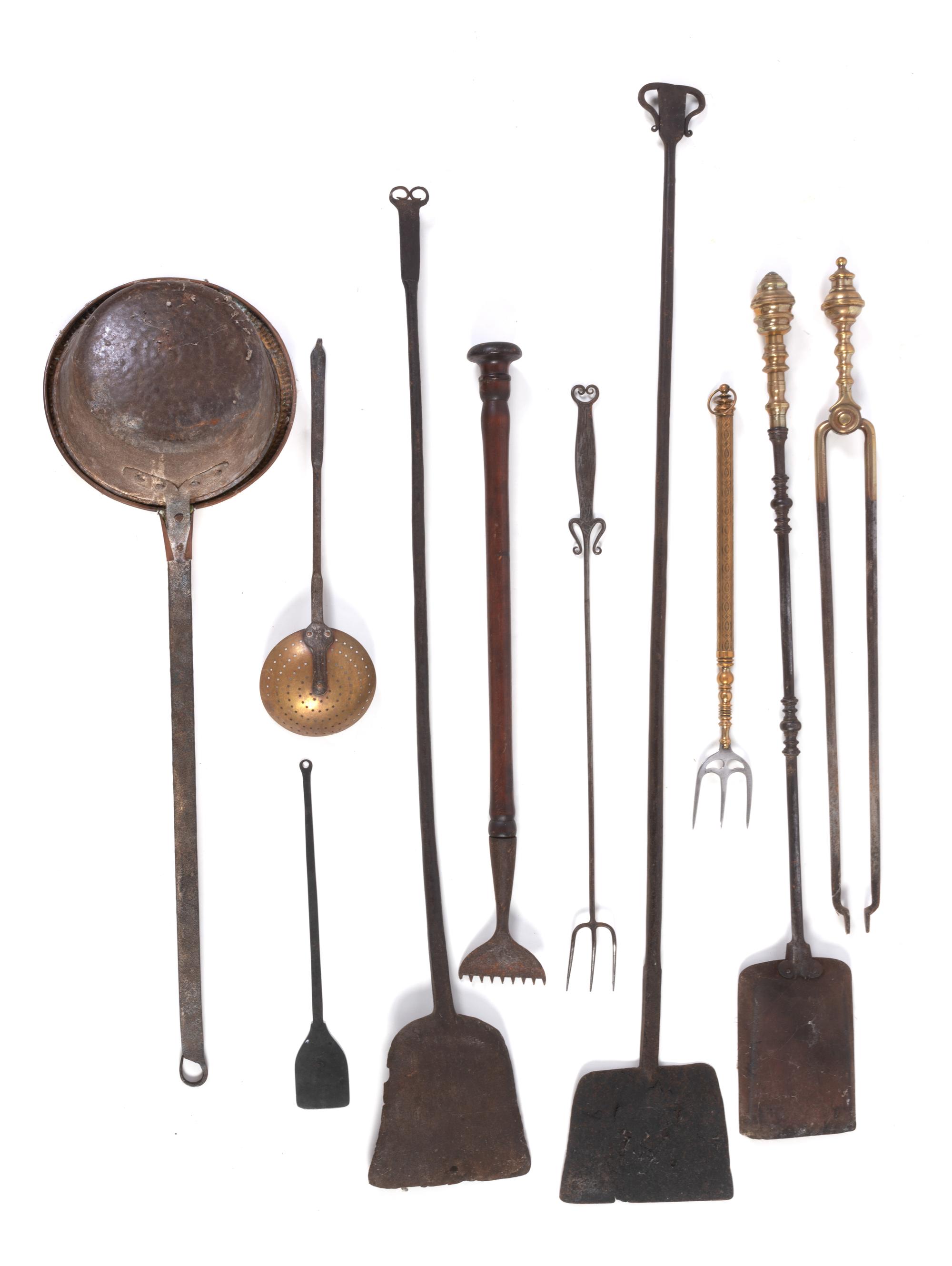 A Group of Wrought-Iron and Brass Hearth Tools