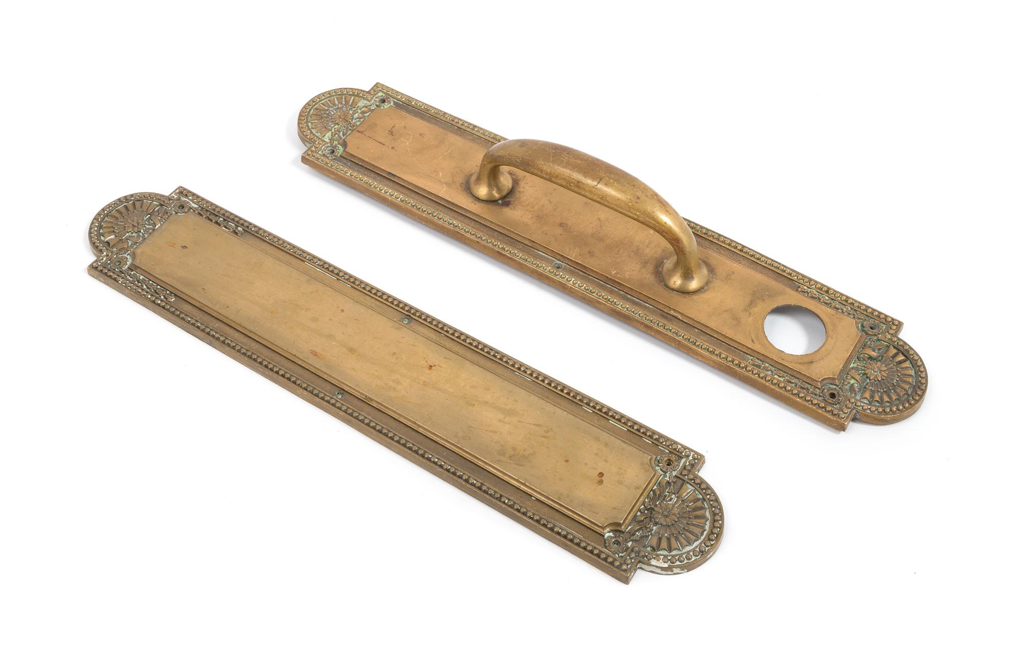 Jarvis Hunt, (American, 1863-1941), a set of Carlton pattern push and pull backplates from the Lake Shore Athletic Club Building, Chica