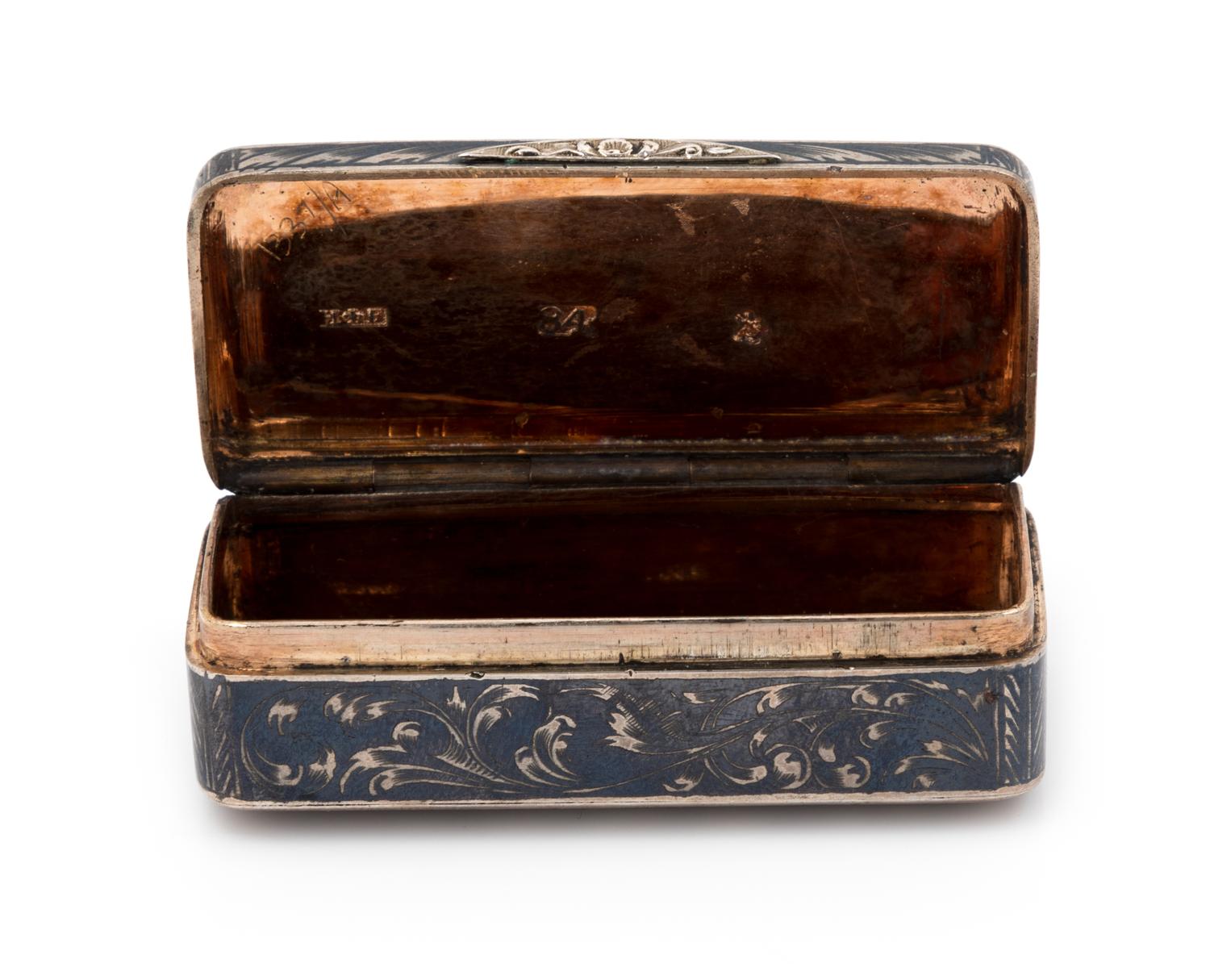 A Russian Niello Silver Snuff Box, Maker's Mark Cyrillic NFG, Moscow, 19th Century, the rectangular case with rounded corners decorated