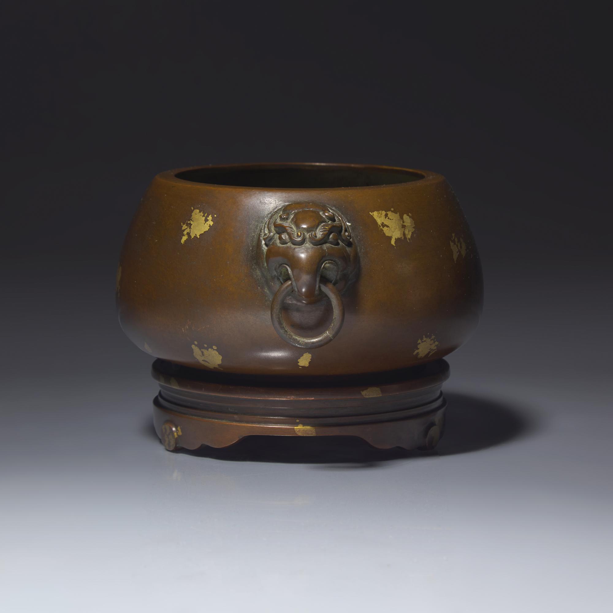 A Chinese Patinated and 'Gold-Splashed' Copper Alloy Censer and Stand — 銅灑金雙耳爐