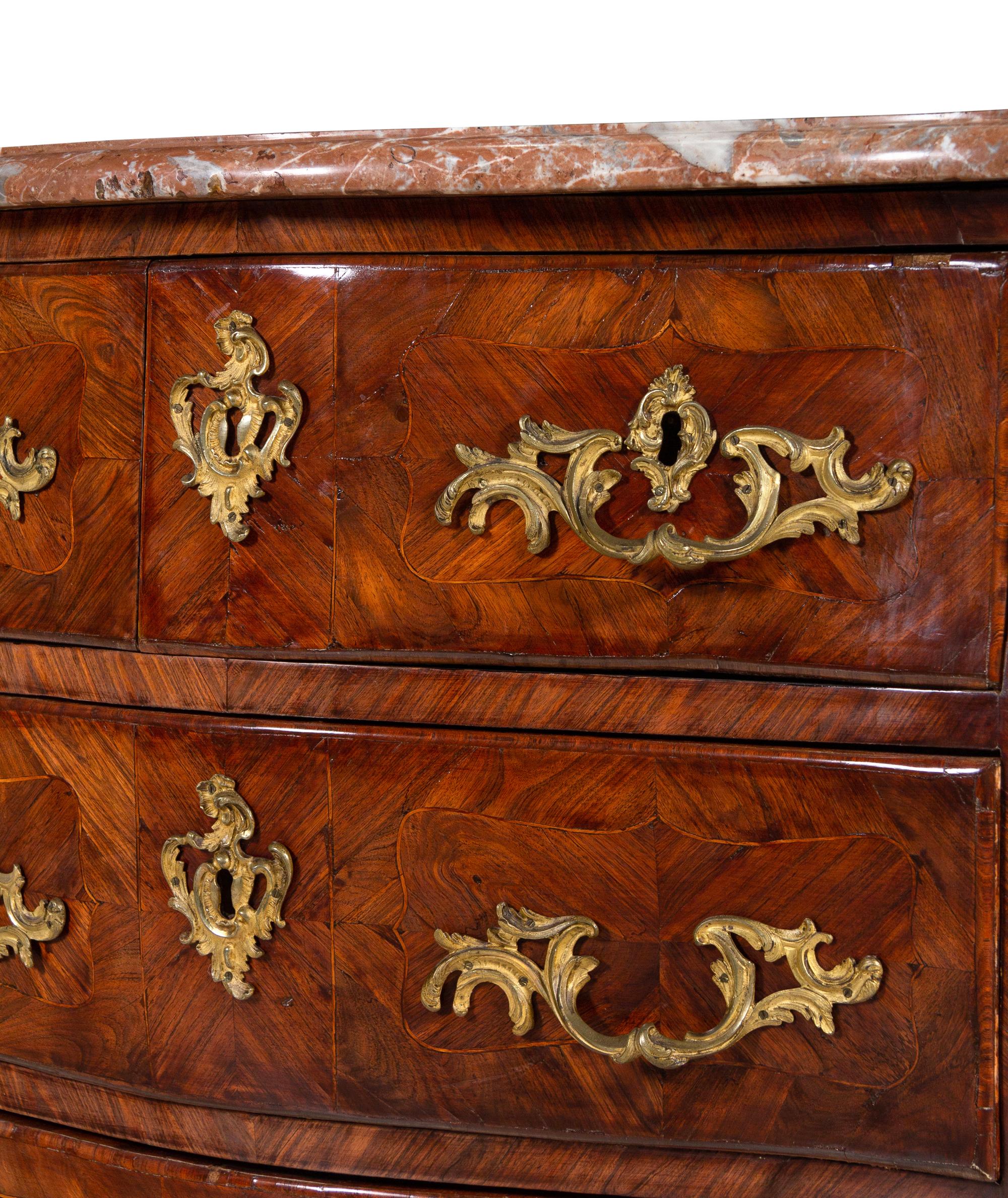 A Régence Gilt Bronze Mounted Kingwood and Tulipwood Marble-Top Commode by Charles-Joseph Dufour (French, 1740-circa 1780)