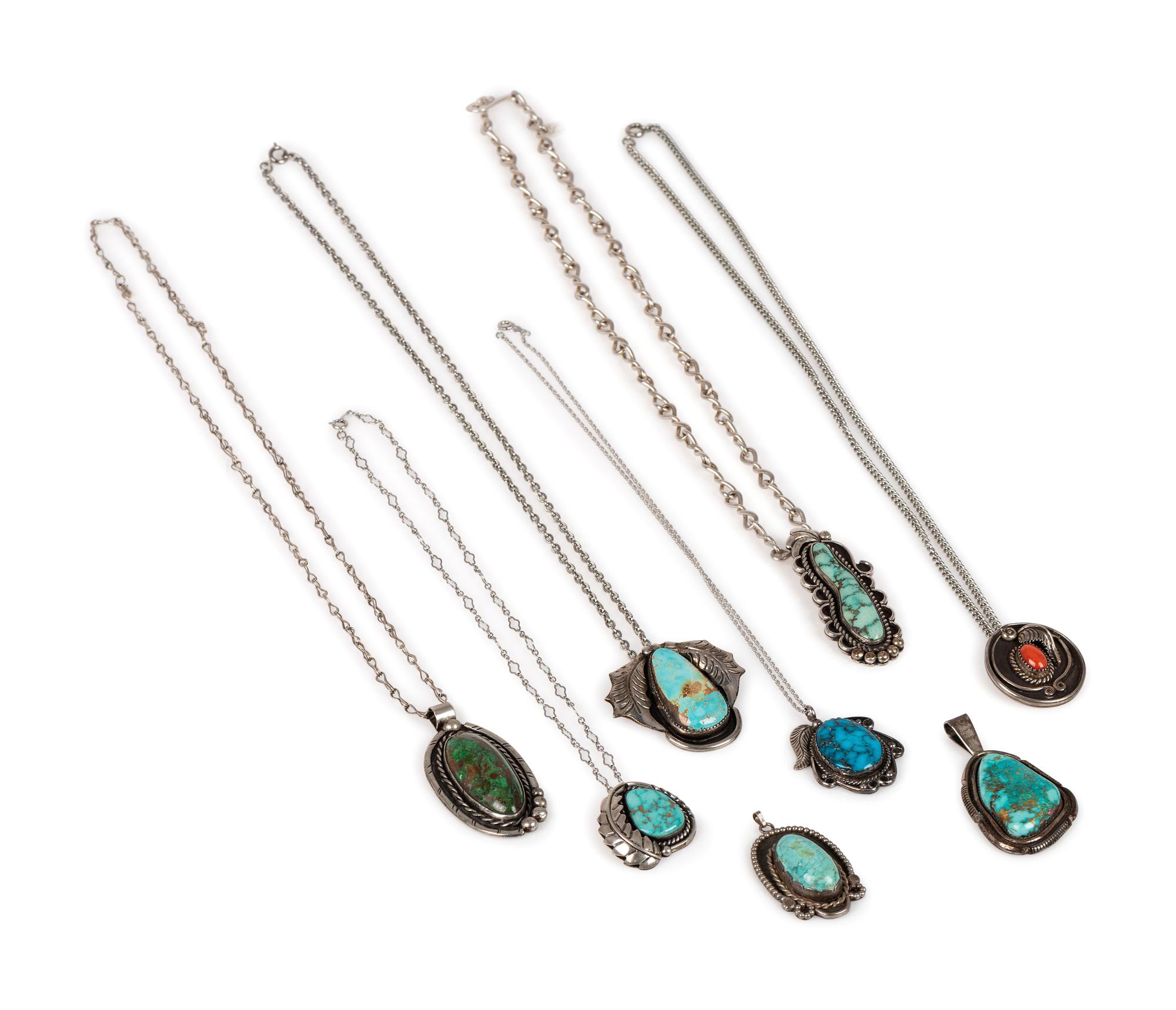 An Assortment Navajo Silver, Coral, and Turquoise Pendants