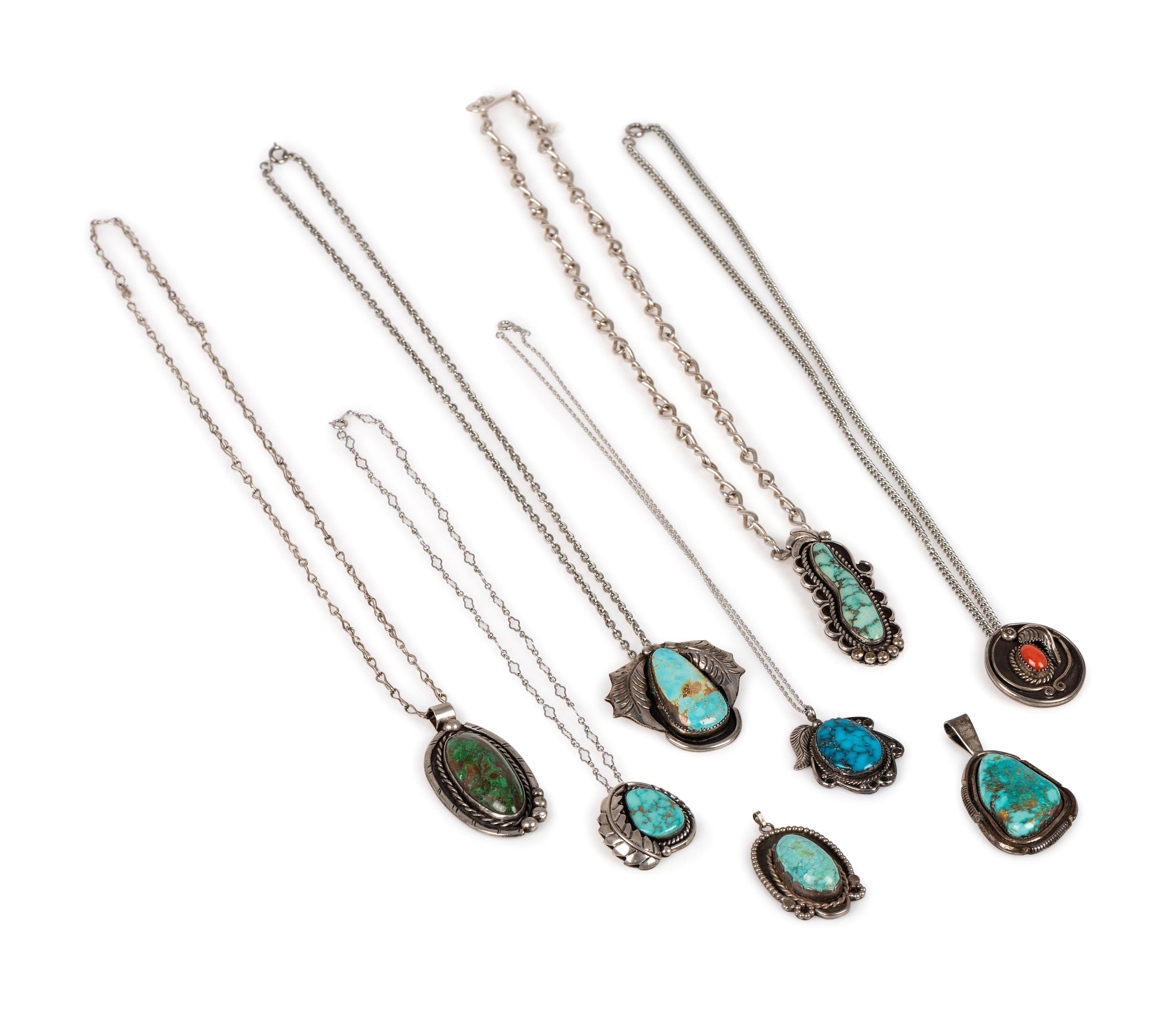 An Assortment Navajo Silver, Coral, and Turquoise Pendants