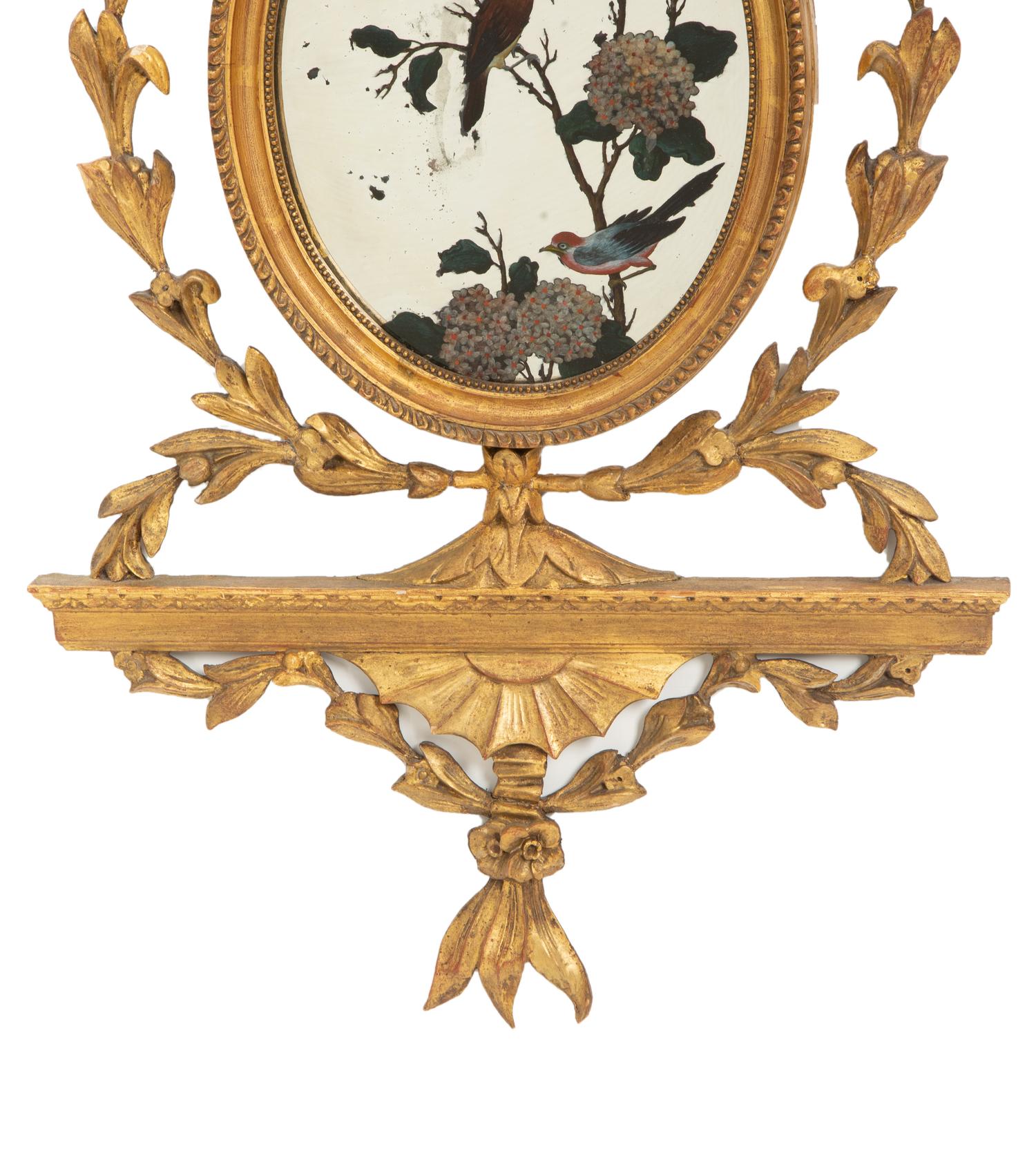 A Pair of George III Giltwood and Reverse-Painted Mirror Wall Appliques