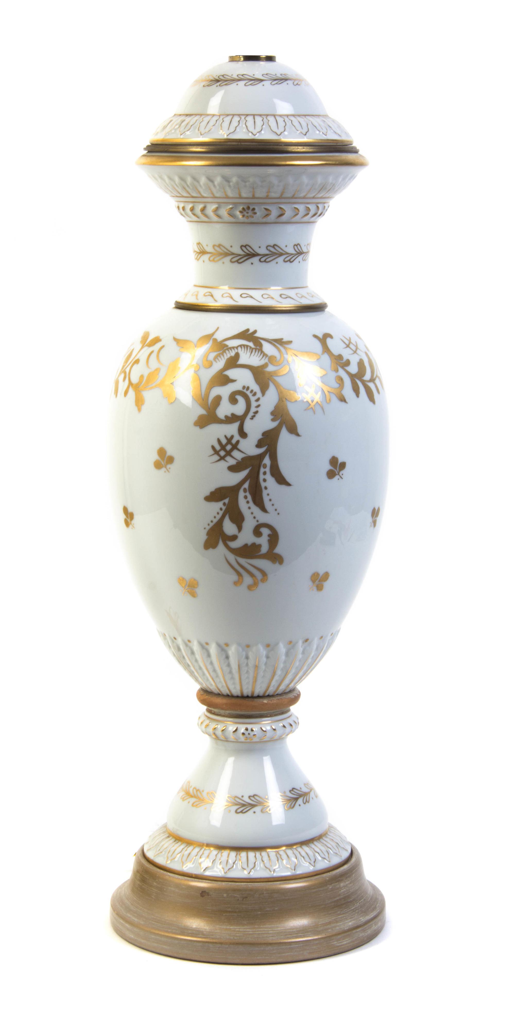 A French Porcelain Covered Urn, Height 21 inches.