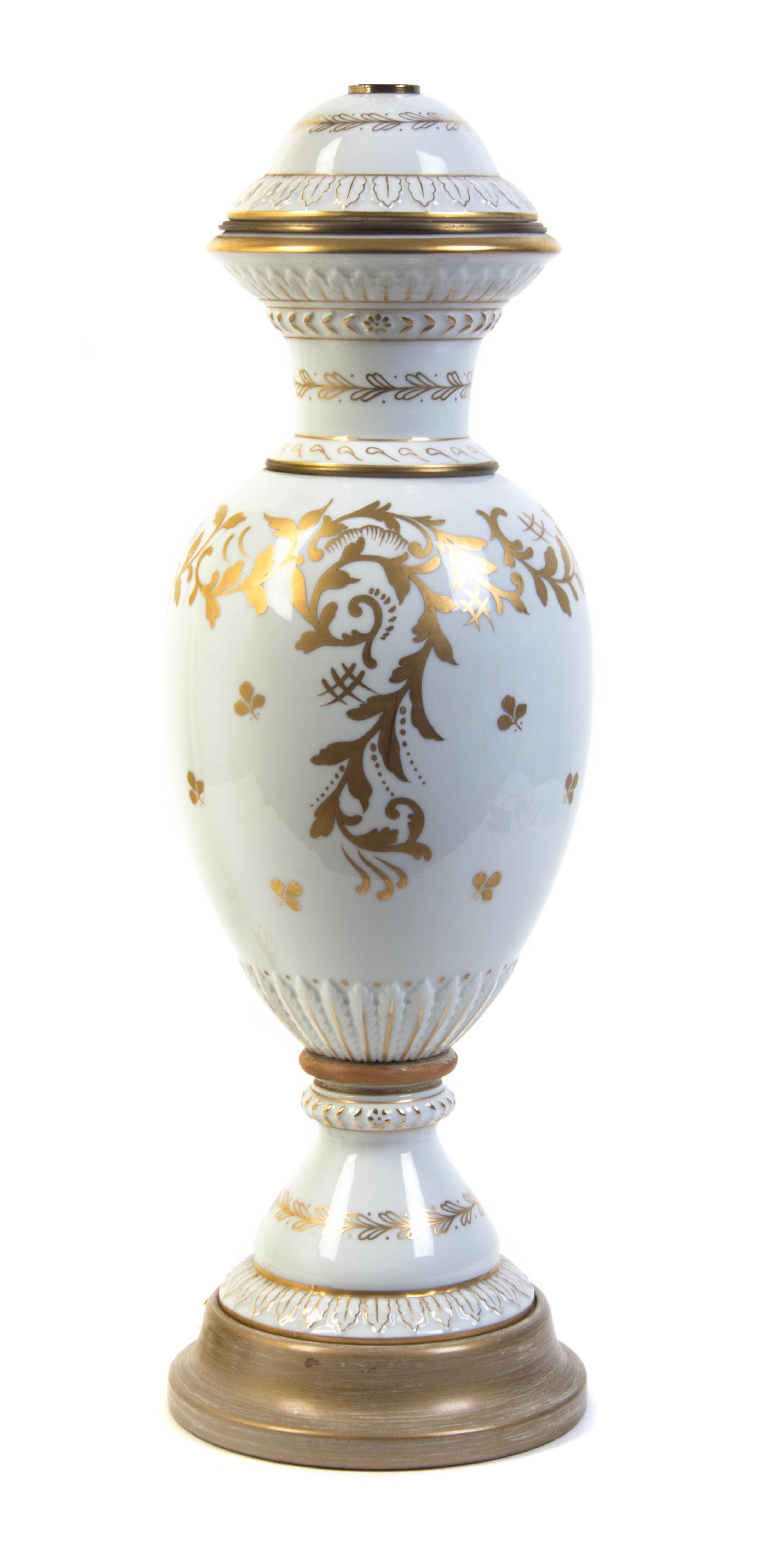 A French Porcelain Covered Urn, Height 21 inches.