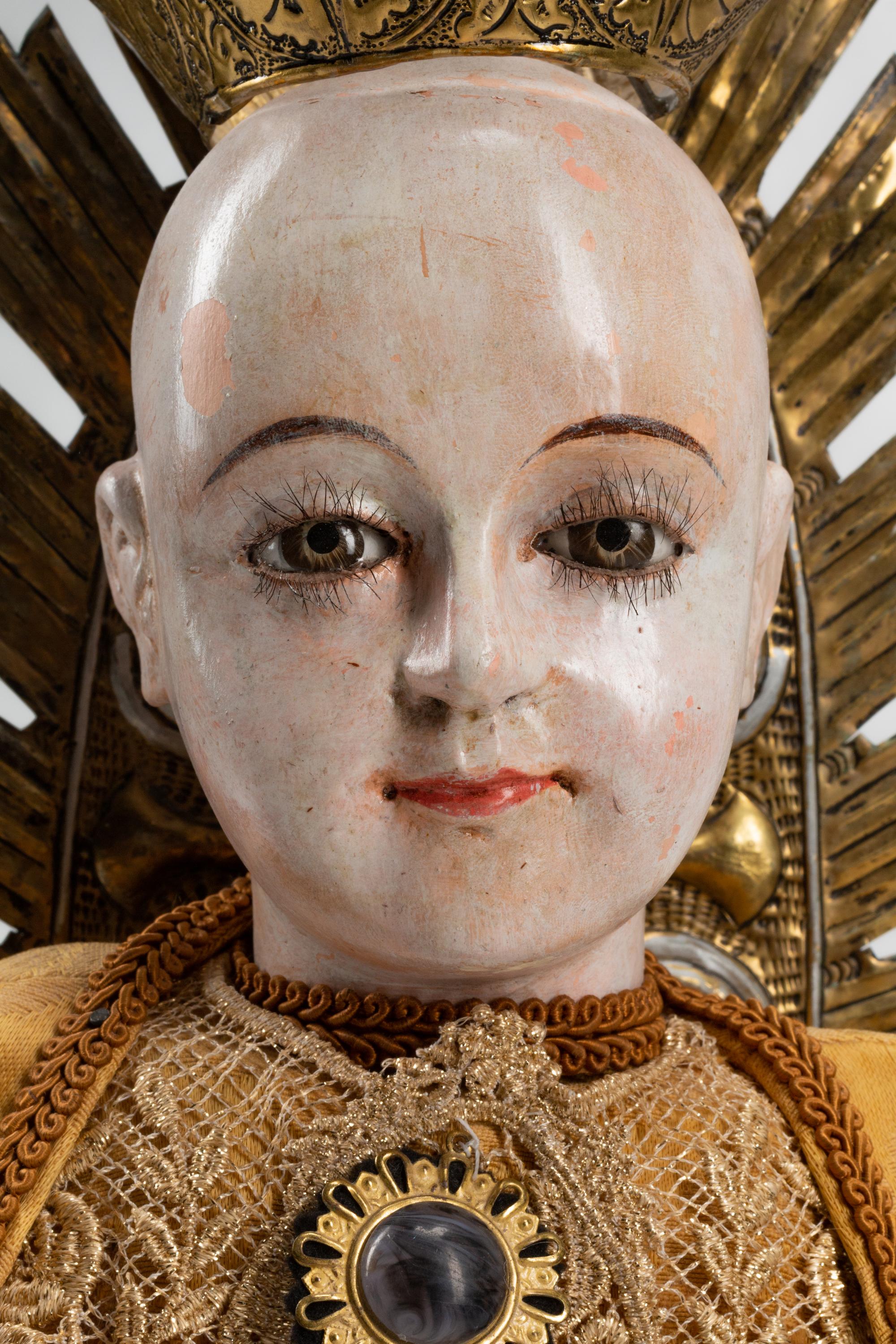 A Spanish Silver-Mounted Figure of a Saint