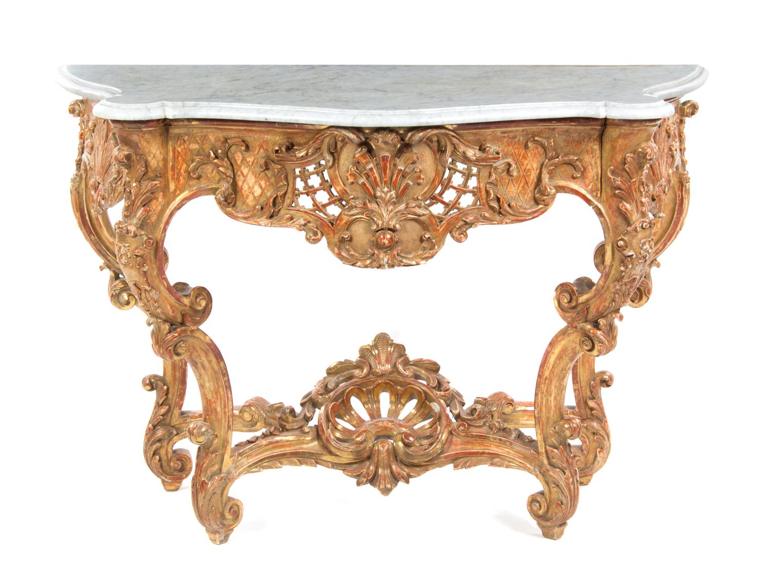 An Italian Roccoco Revival Giltwood Console Table, MID-19TH CENTURY, Height 37 1/2 x width 53 1/2 x depth 25 inches. — MID-19TH CENTURY,