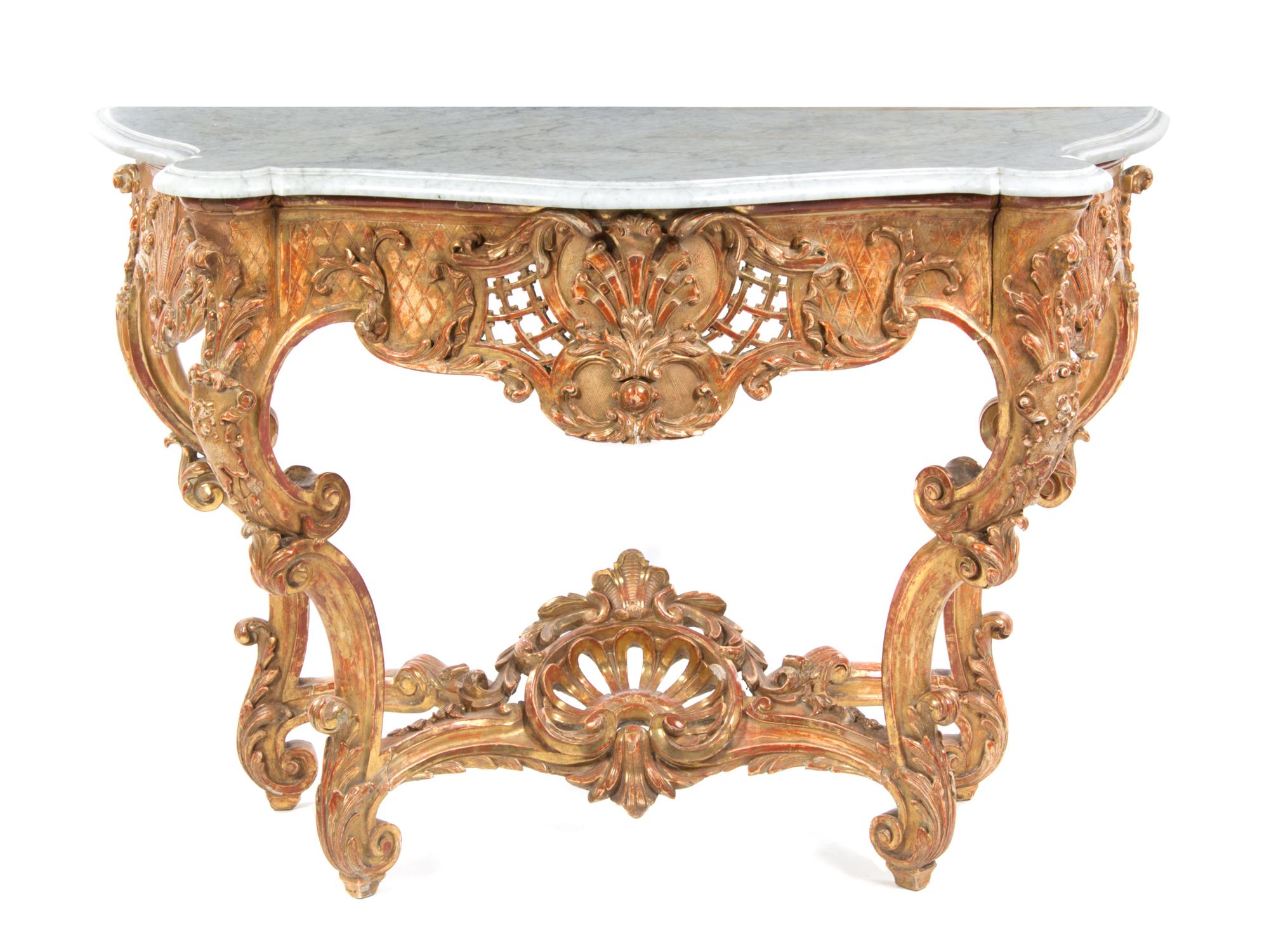 An Italian Roccoco Revival Giltwood Console Table, MID-19TH CENTURY, Height 37 1/2 x width 53 1/2 x depth 25 inches. — MID-19TH CENTURY,