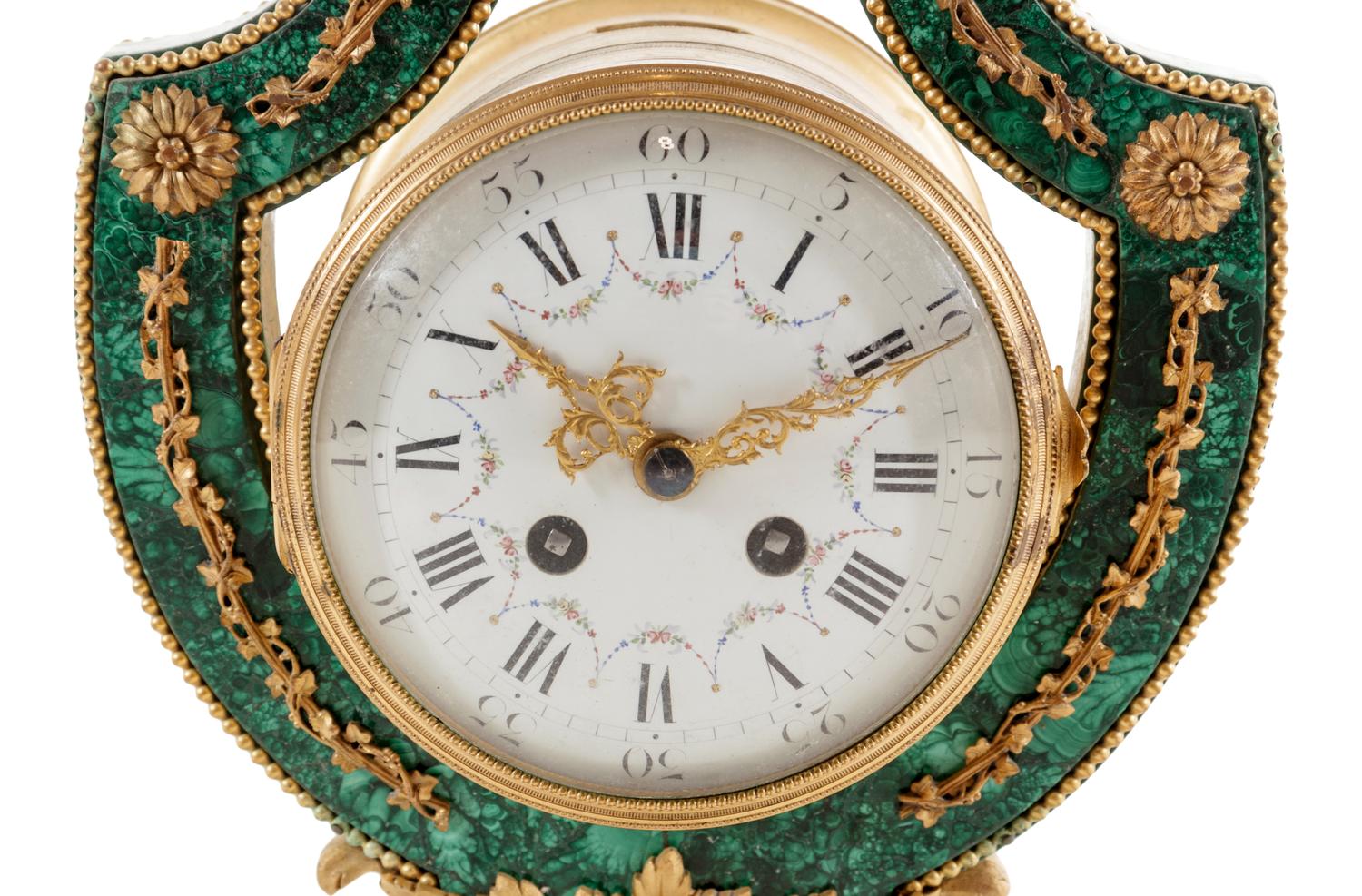A Louis XIV Style Gilt Metal Mounted Malachite Veneered Harp Clock