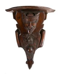 A Carved Wood Corner Bracket, Height 20 1/4 inches.