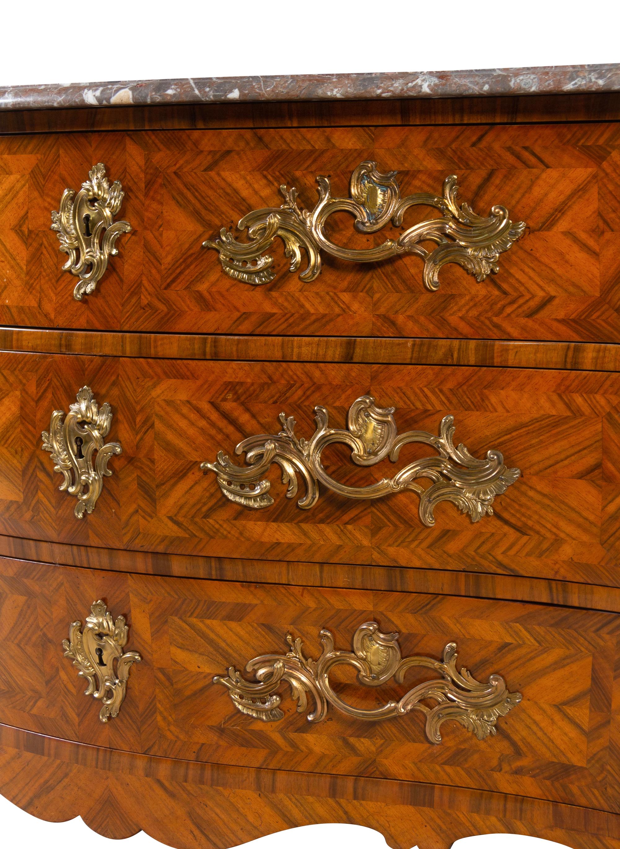 A Louis XV Gilt Bronze Mounted Parquetry Marble-Top Commode