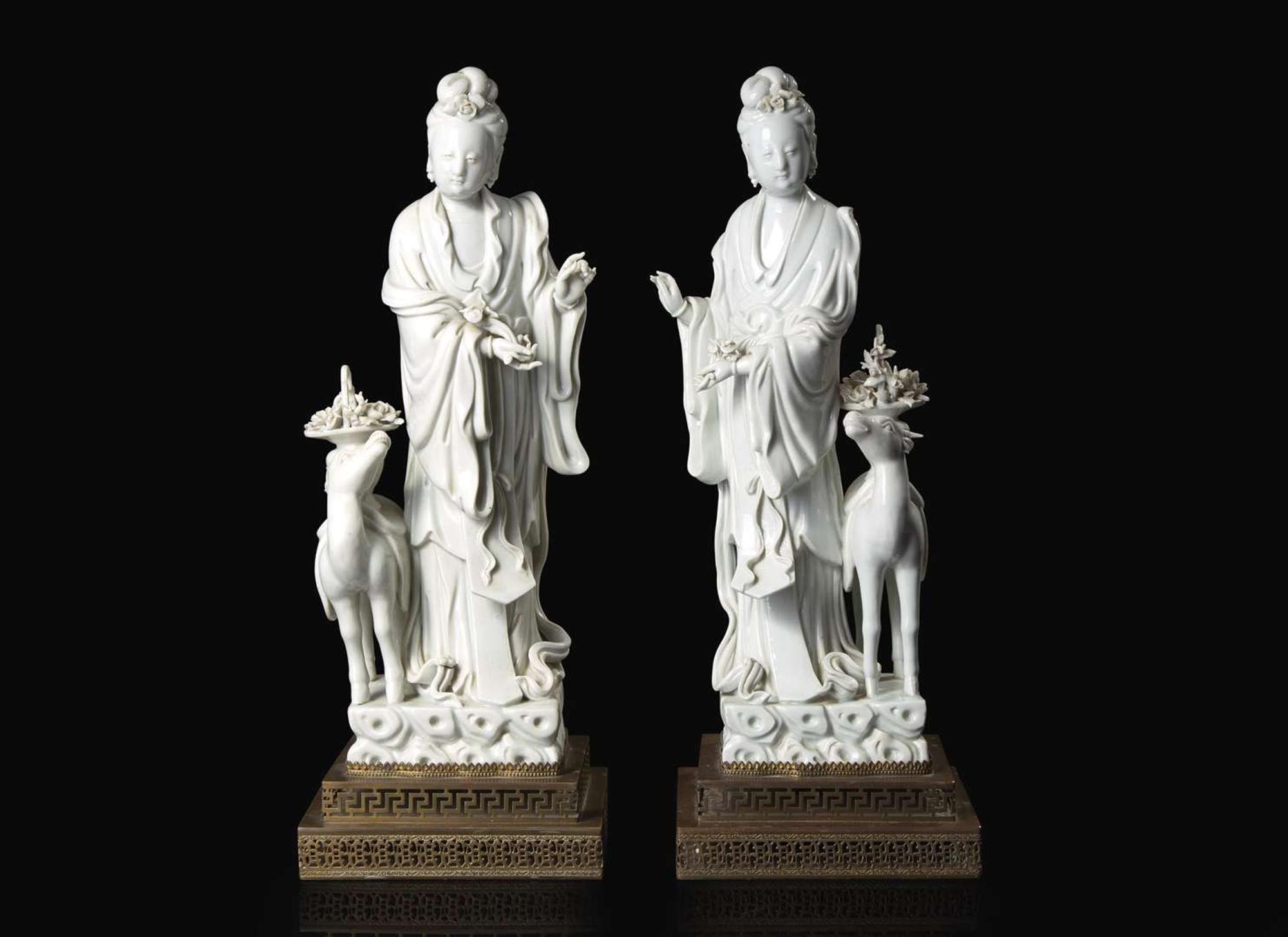 A pair of Chinese Blanc de Chine Figures of Meiren with Deer, Xu Yunlin Zhi impressed mark 德化窯仕女仙鹿瓷塑一對 許雲林製款