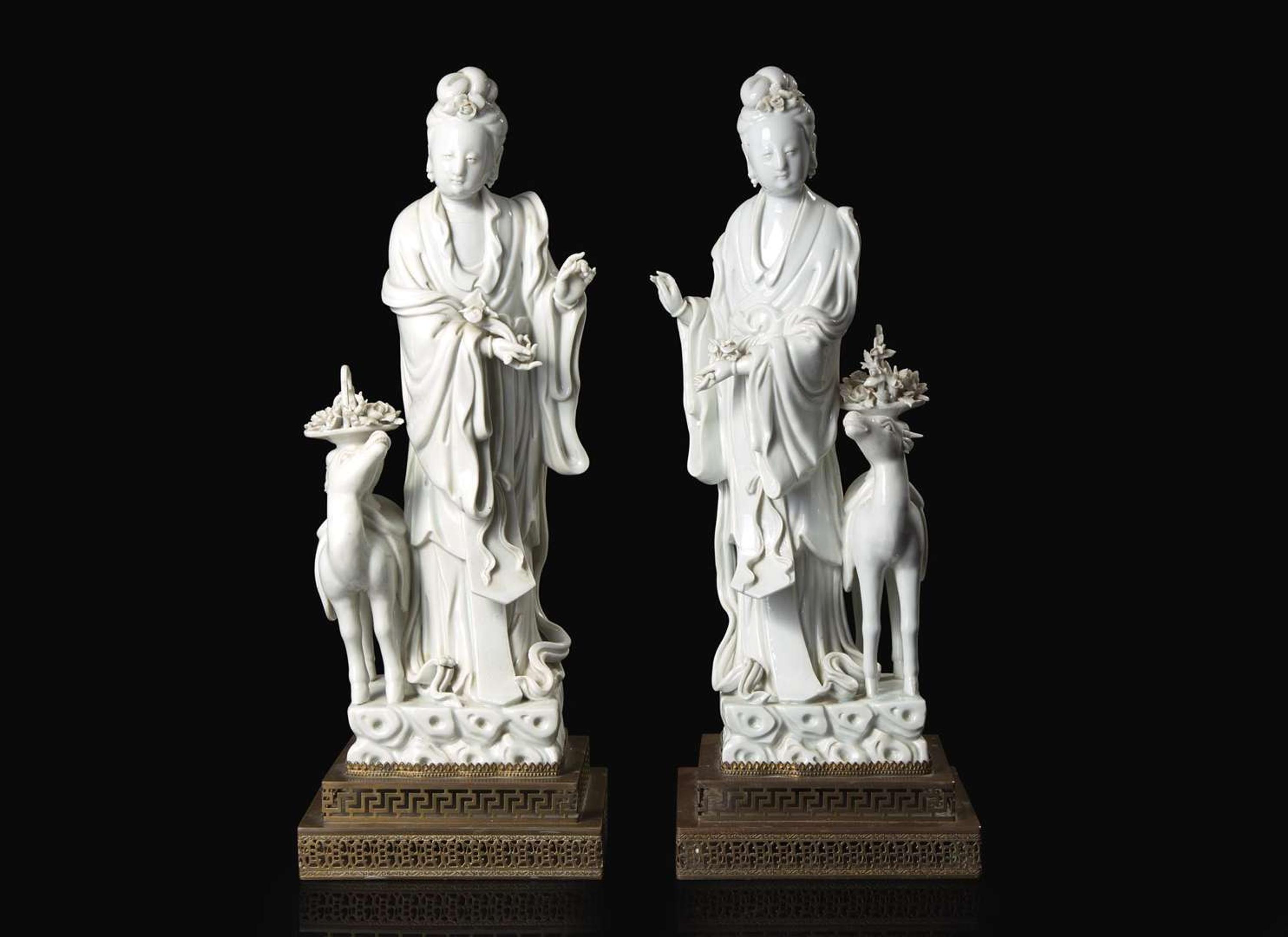 A pair of Chinese Blanc de Chine Figures of Meiren with Deer, Xu Yunlin Zhi impressed mark 德化窯仕女仙鹿瓷塑一對 許雲林製款