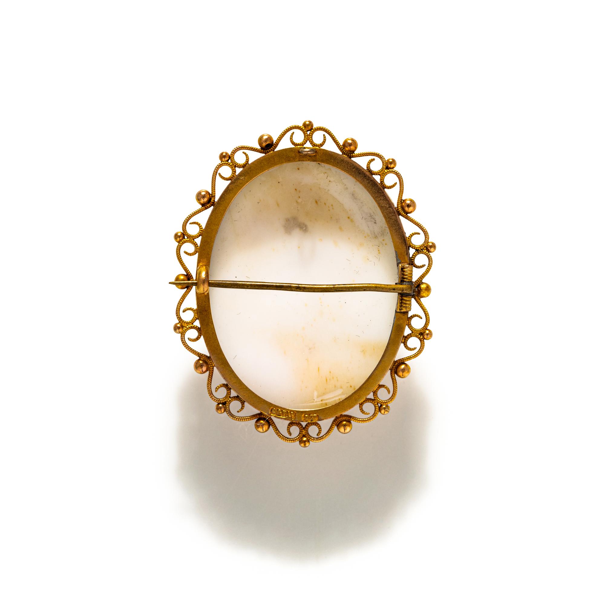 A Neoclassical Gold and Shell Double Headed Cameo Brooch with the Goddesses Athena and Hera