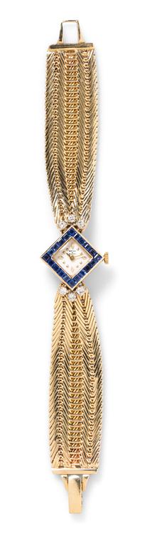 A 14 Karat Yellow Gold, Sapphire and Diamond Watch, Bryan and Scott, 28.50 dwts.