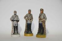 A Group of Eight Figural Pottery Bottles Height of tallest 12 1/4 inches.