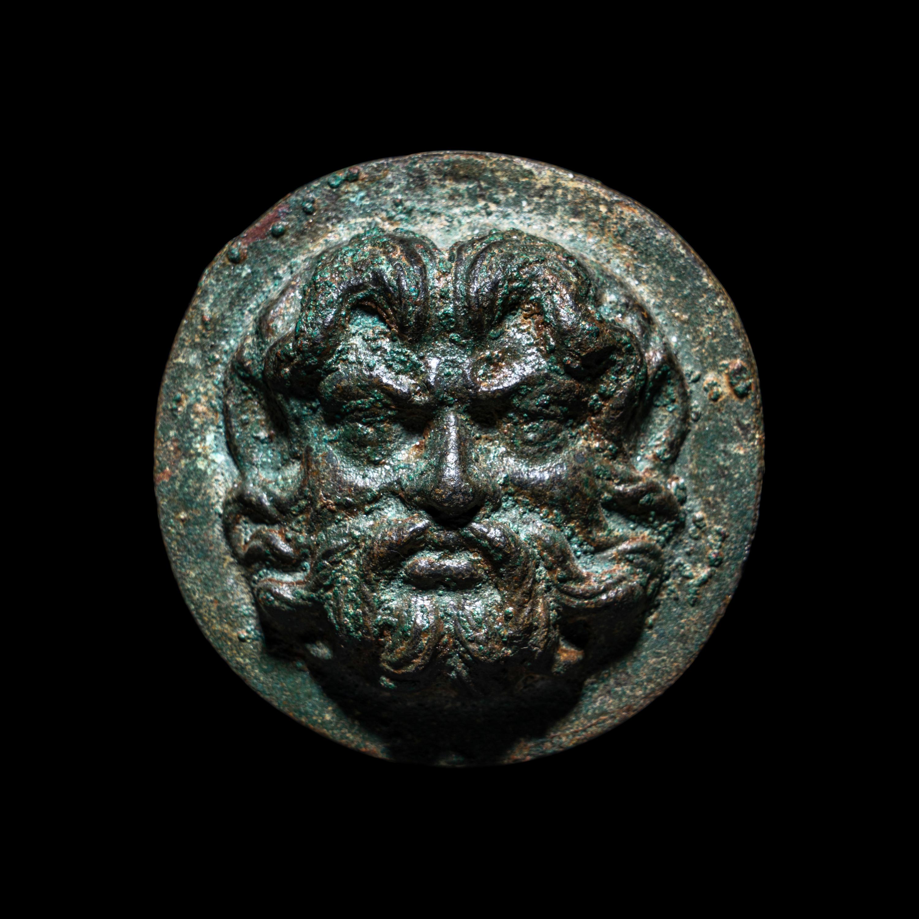 A Hellenistic Bronze Applique in the Form of a Satyr's Head