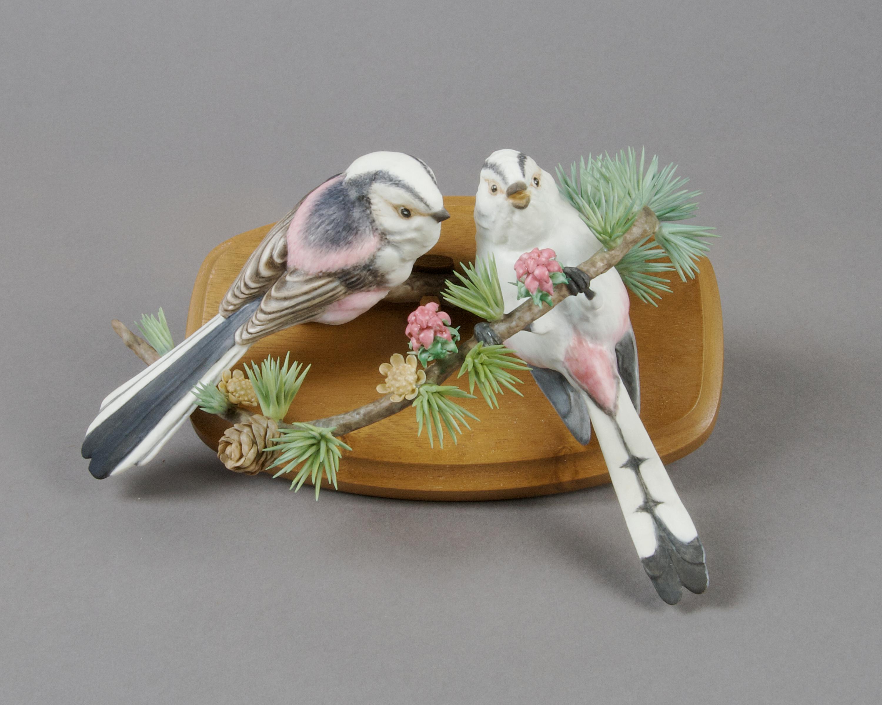 A Royal Worcester Dorothy Doughty Figural Group, Long Tailed Tits. Length 8 1/2 inches.