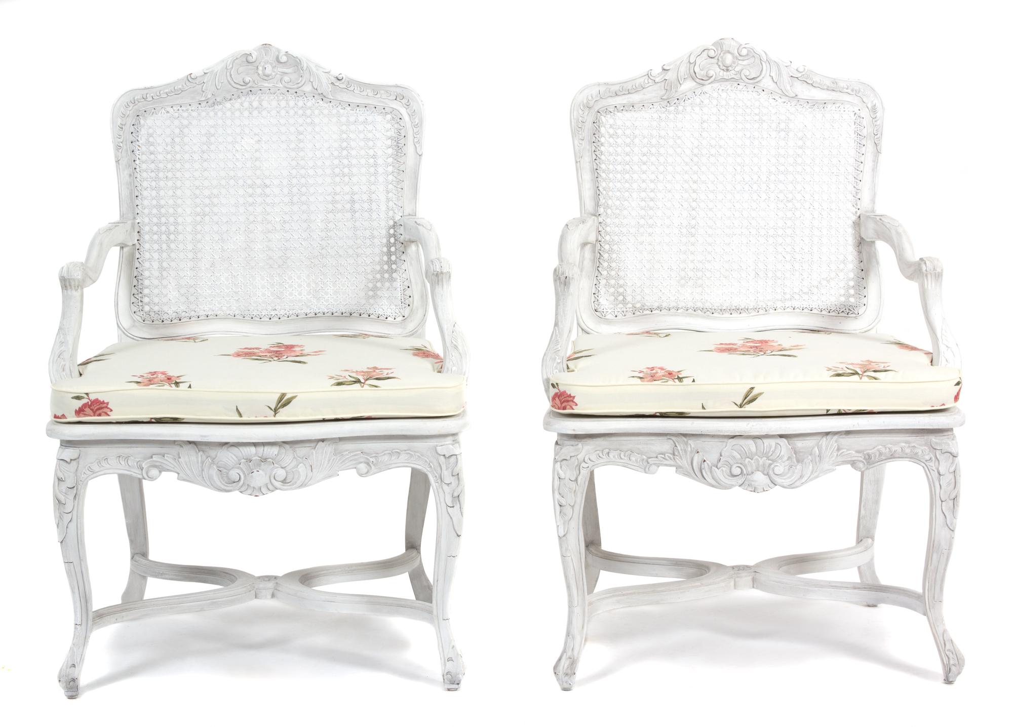 A Pair of Louis XV Style Cane Back and Seat Fauteuils Height 38 inches. — 20TH CENTURY