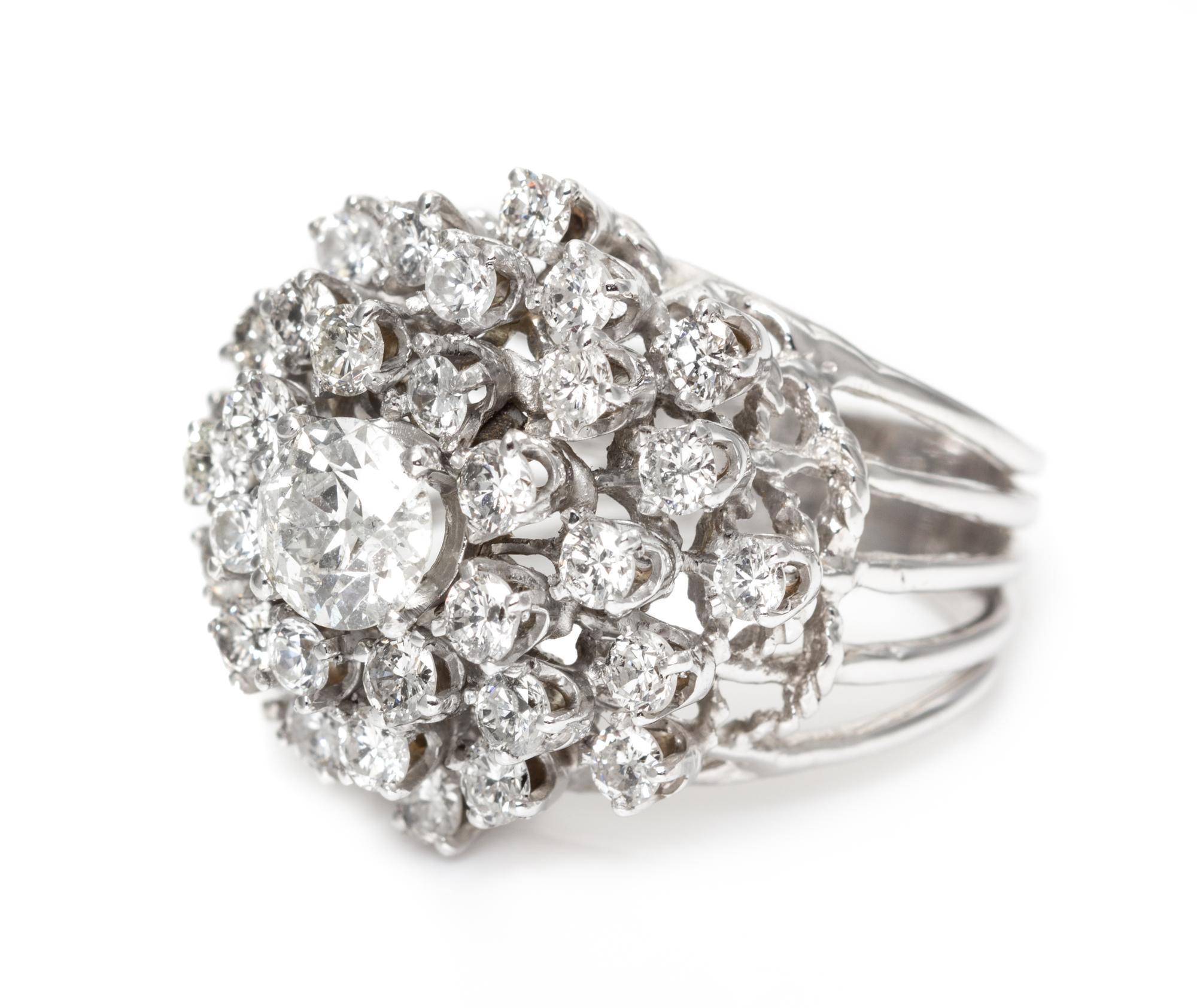 A 14 Karat White Gold and Diamond Ring, 7.10 dwts.