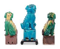 Three Chinese Porcelain Figures of Fu Lions
