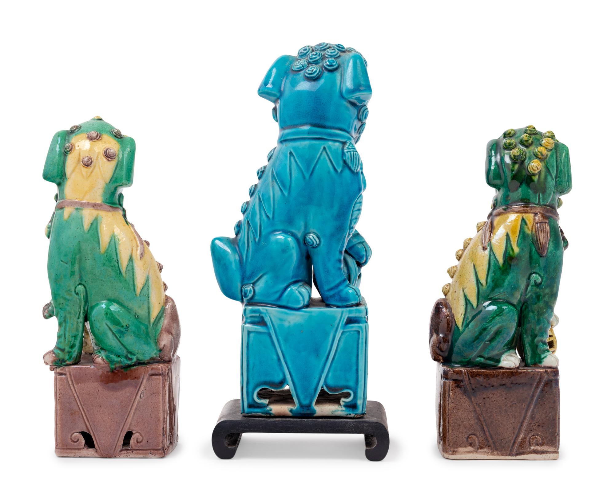 Three Chinese Porcelain Figures of Fu Lions