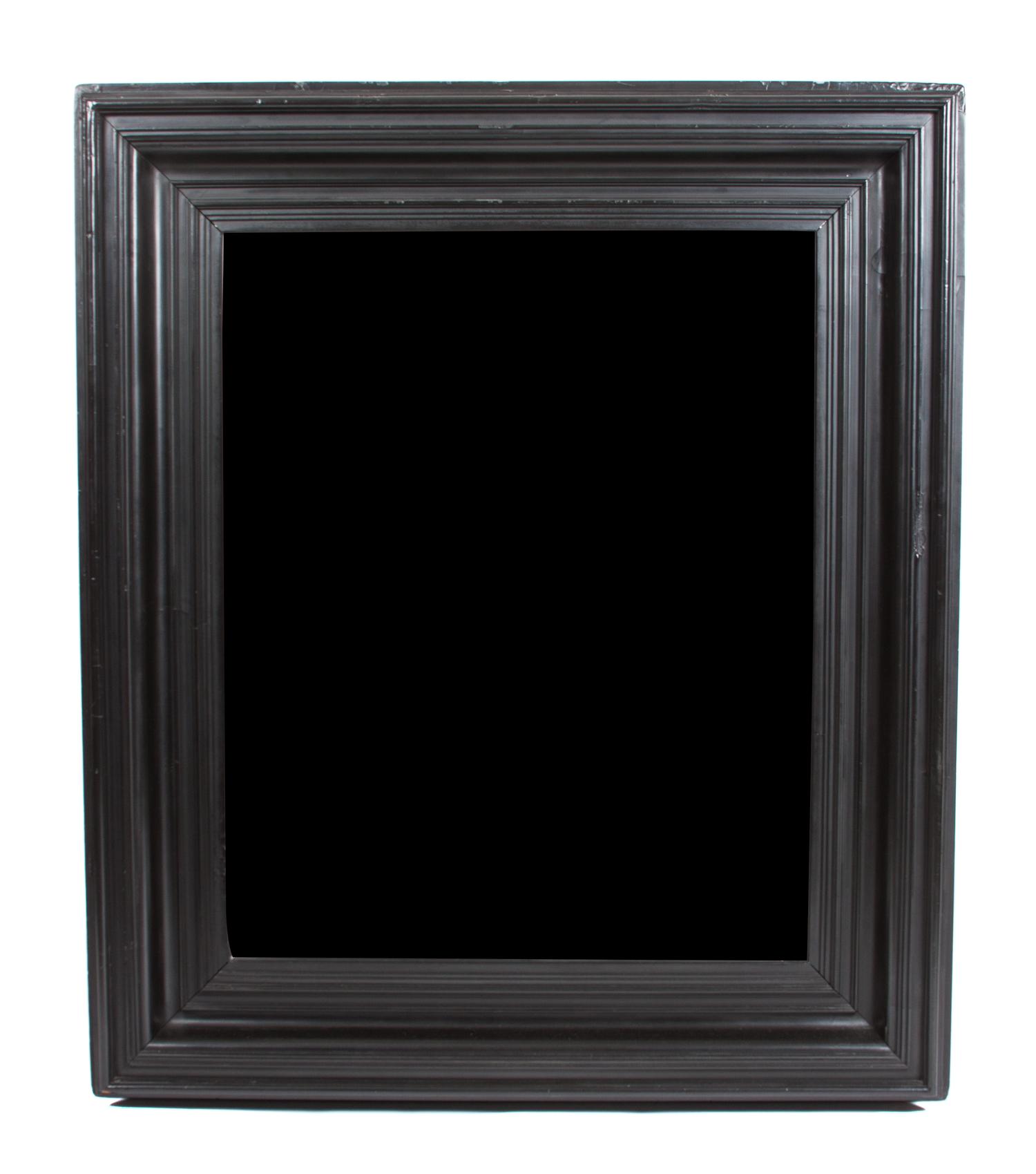 An Ebony Framed Mirror Height 47 x width 41 inches.