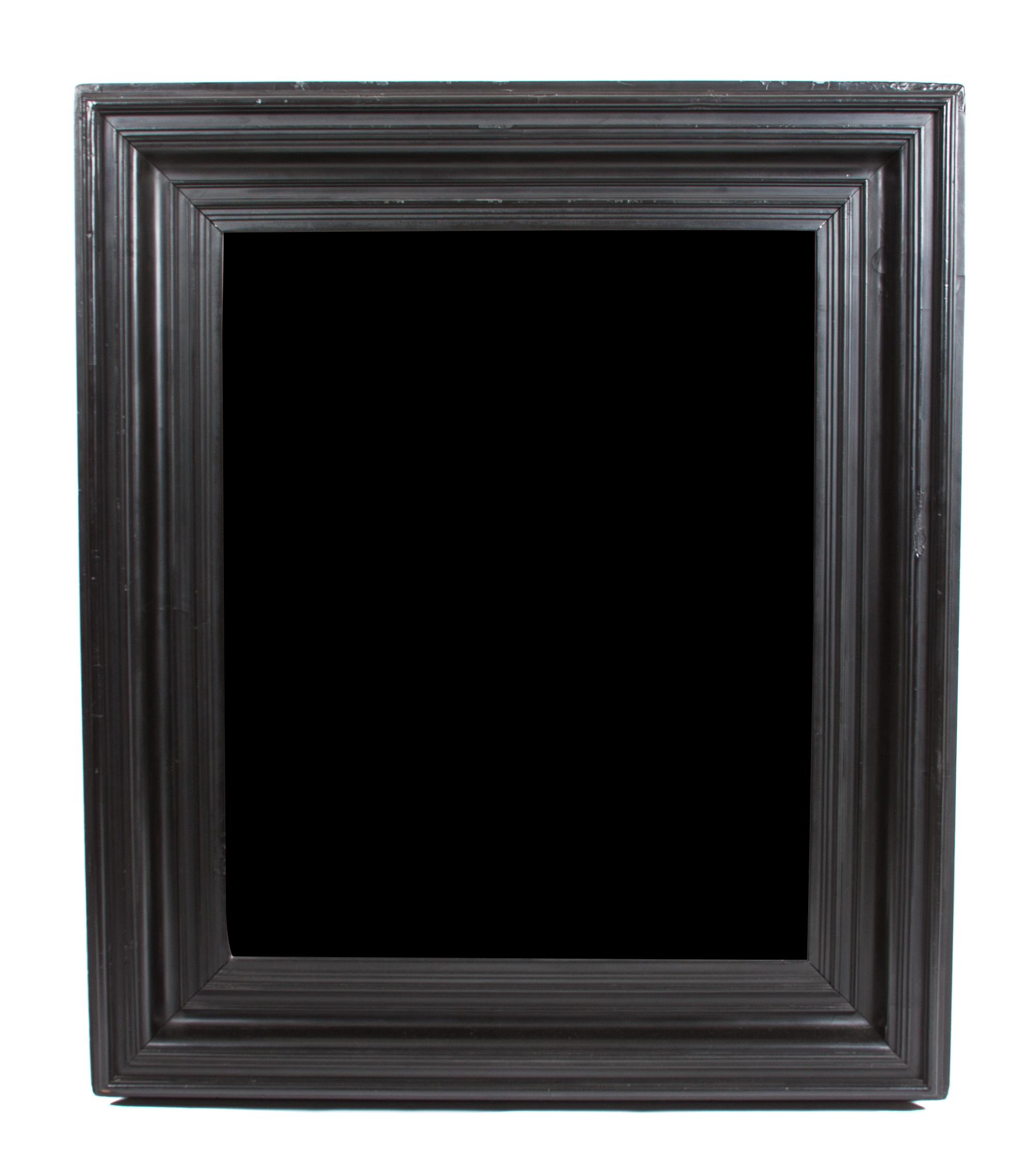 An Ebony Framed Mirror Height 47 x width 41 inches.