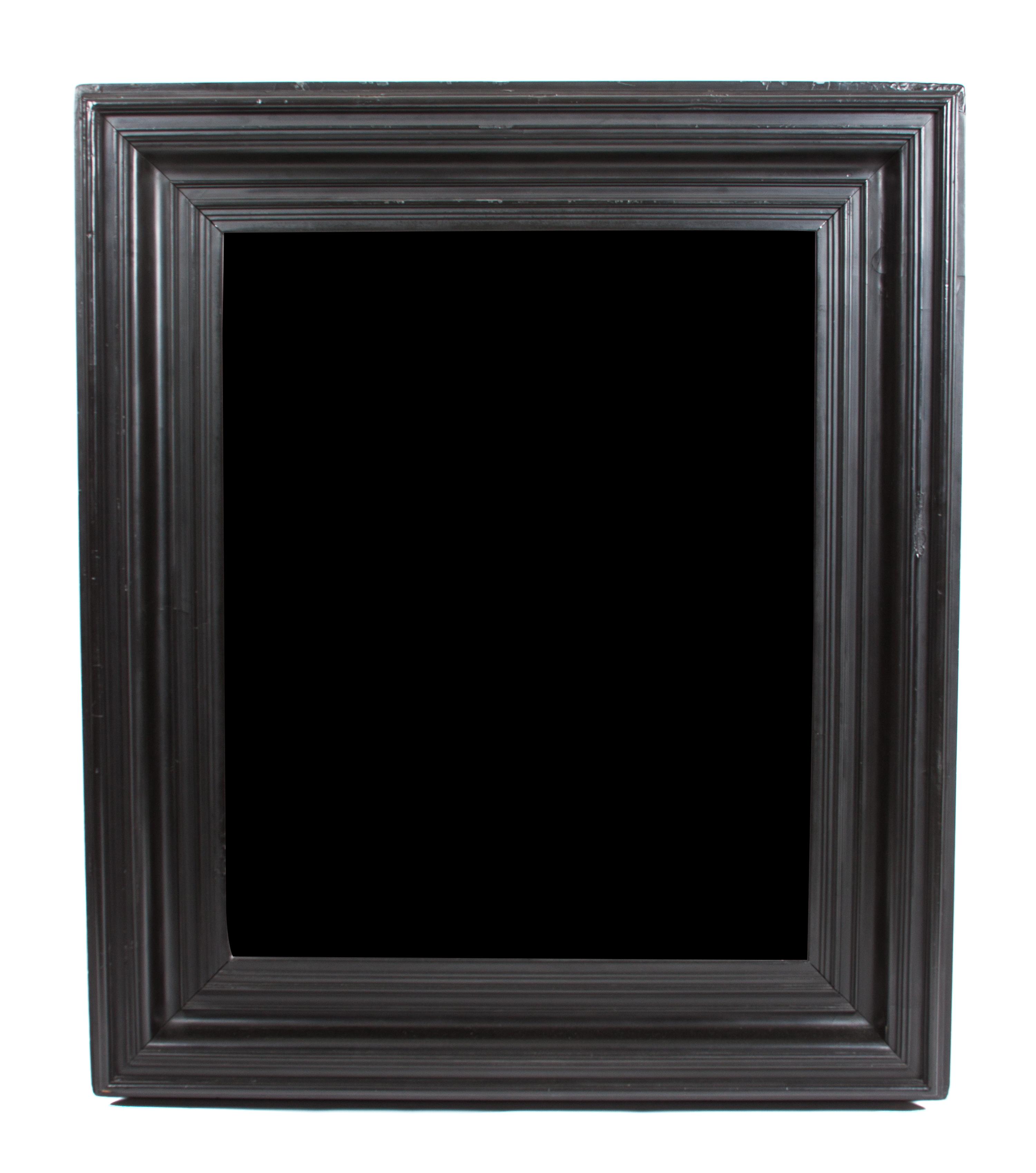 An Ebony Framed Mirror Height 47 x width 41 inches.