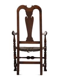 A Queen Anne Mixed Woods Rush-Seat Spanish-Foot Armchair
