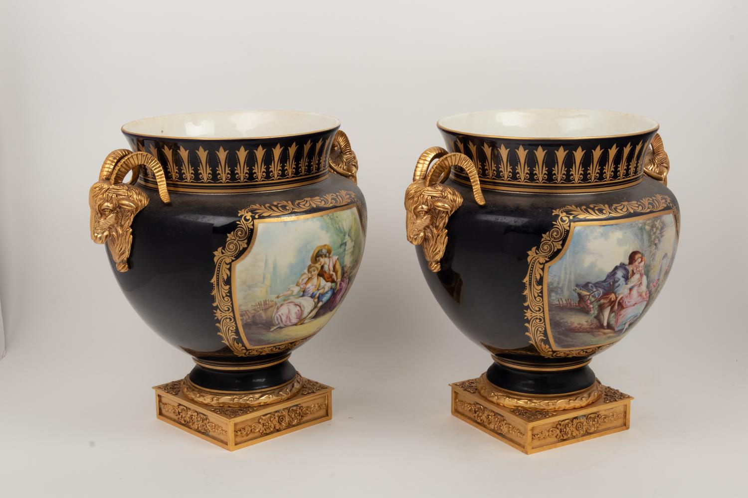 A Pair of Sèvres Style Gilt Bronze Mounted Porcelain Vases