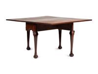 A Very Rare Pair of Chippendale Carved Walnut Claw-and-Ball Foot Drop-Leaf Dining Tables, 18th Century