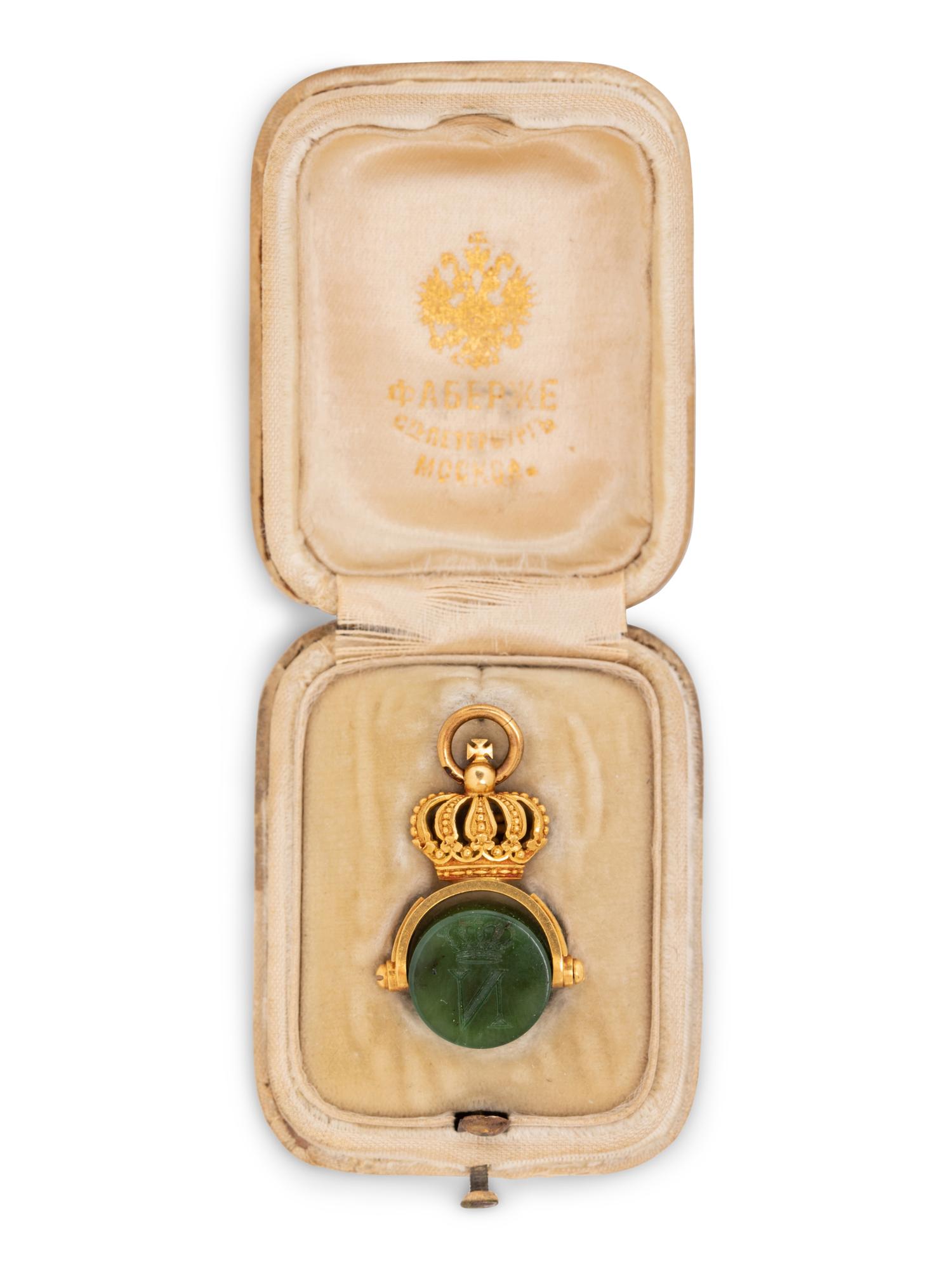 A Russian Yellow Gold and Carved Nephrite Swivel Seal