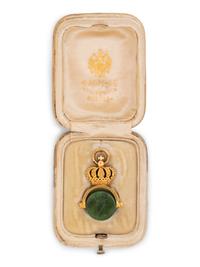 A Russian Yellow Gold and Carved Nephrite Swivel Seal