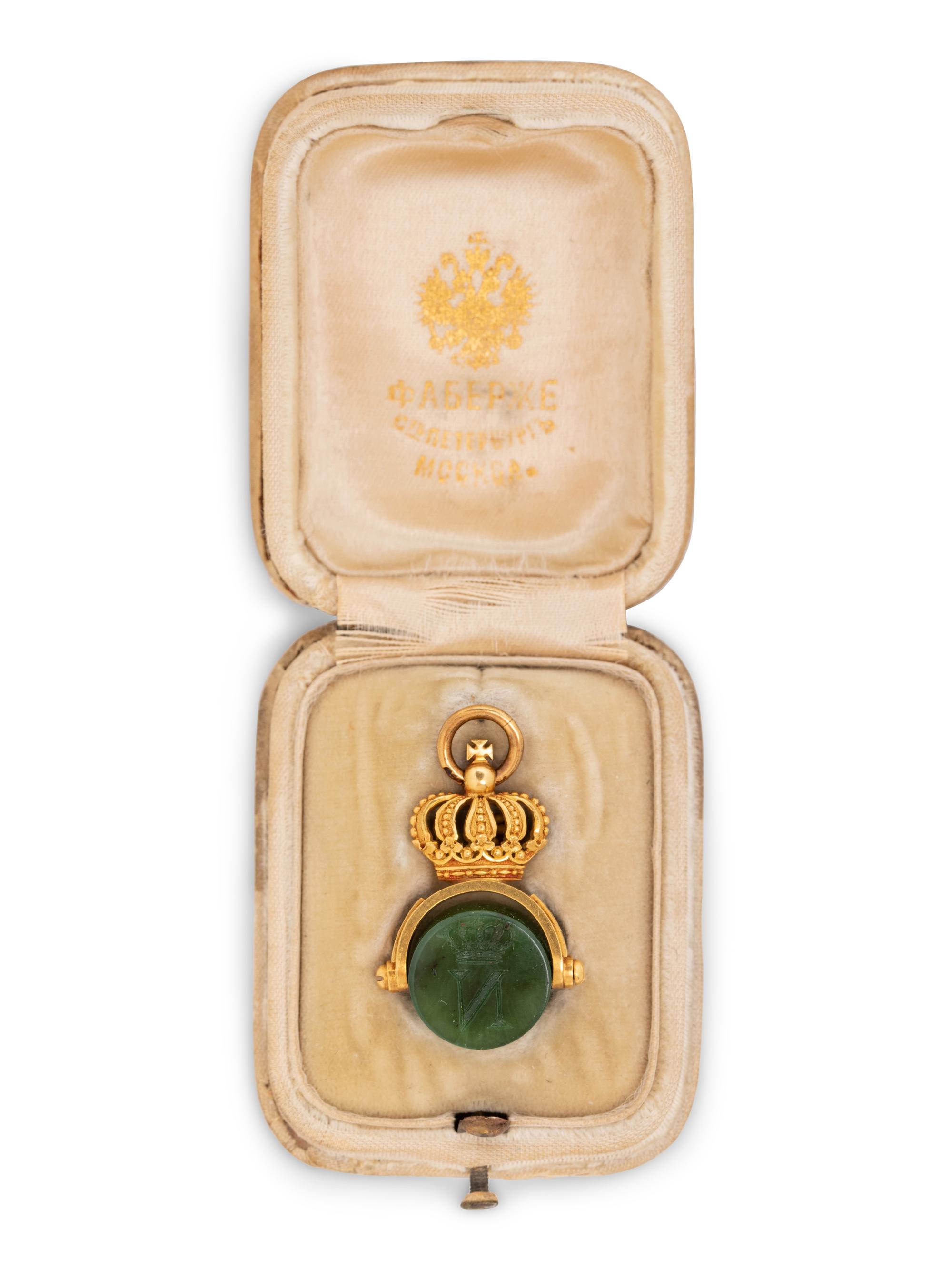 A Russian Yellow Gold and Carved Nephrite Swivel Seal