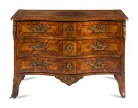 A Continental Gilt Bronze Mounted Burlwood Serpentine Commode