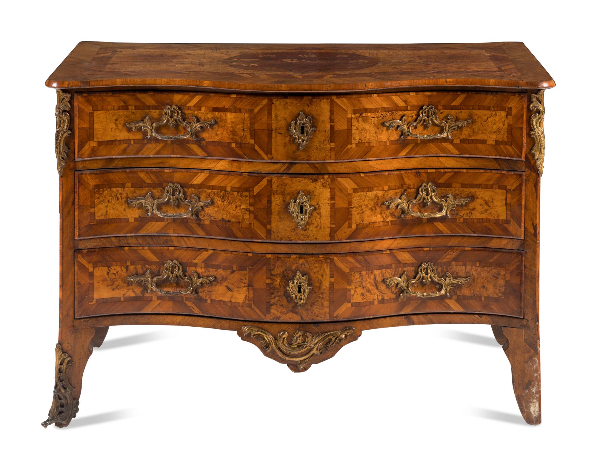 A Continental Gilt Bronze Mounted Burlwood Serpentine Commode