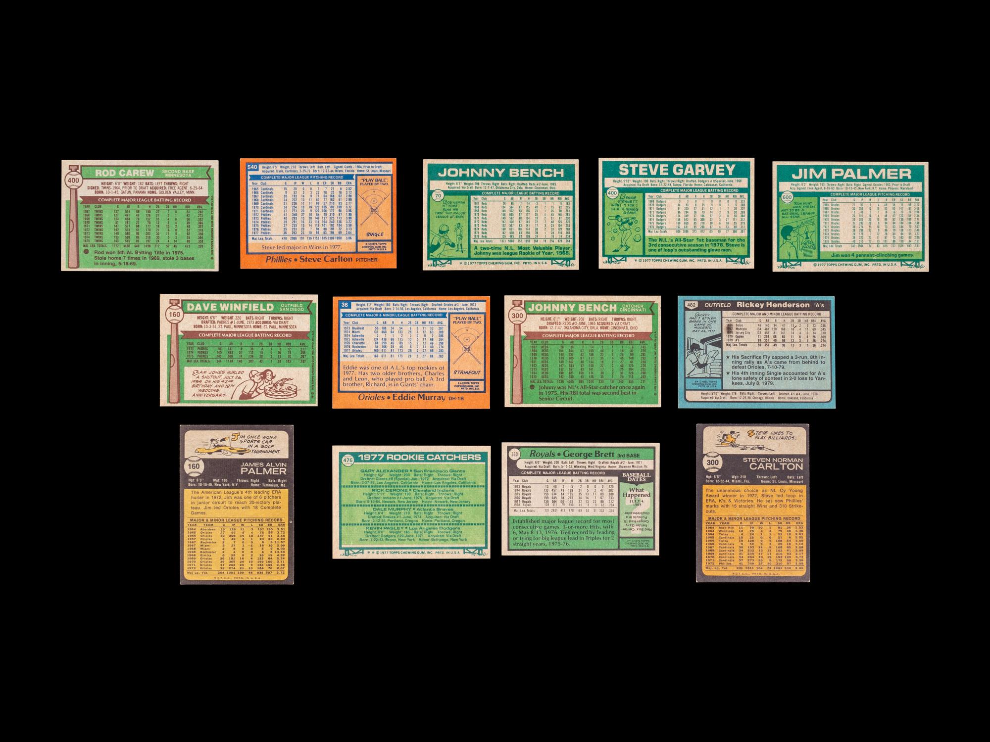 A Group of 13 Topps Hall of Fame and Star Baseball Cards Including Rickey Henderson and Eddie Murray Rookies,