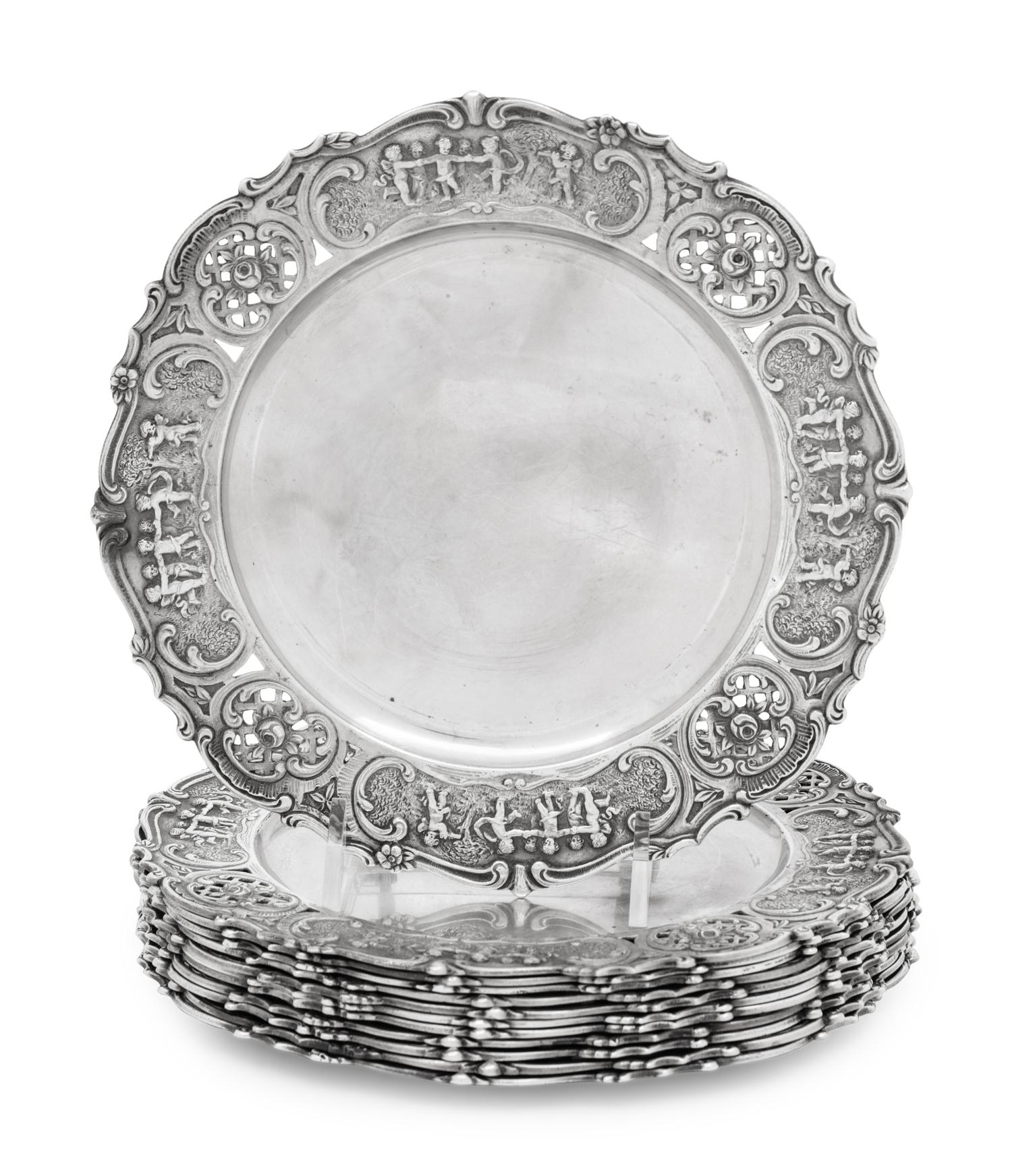 A Set of Twelve American Silver Bread Plates