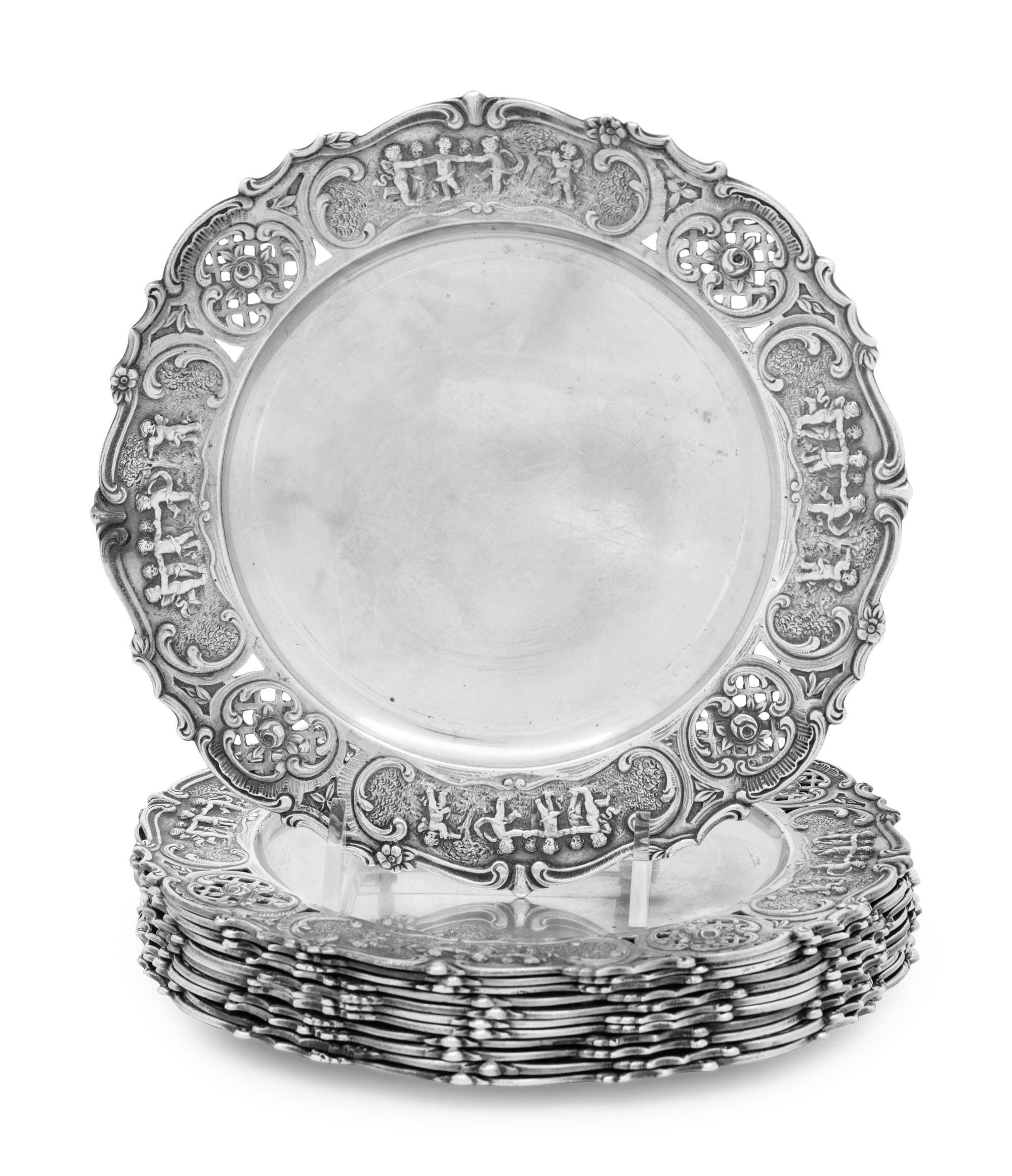 A Set of Twelve American Silver Bread Plates