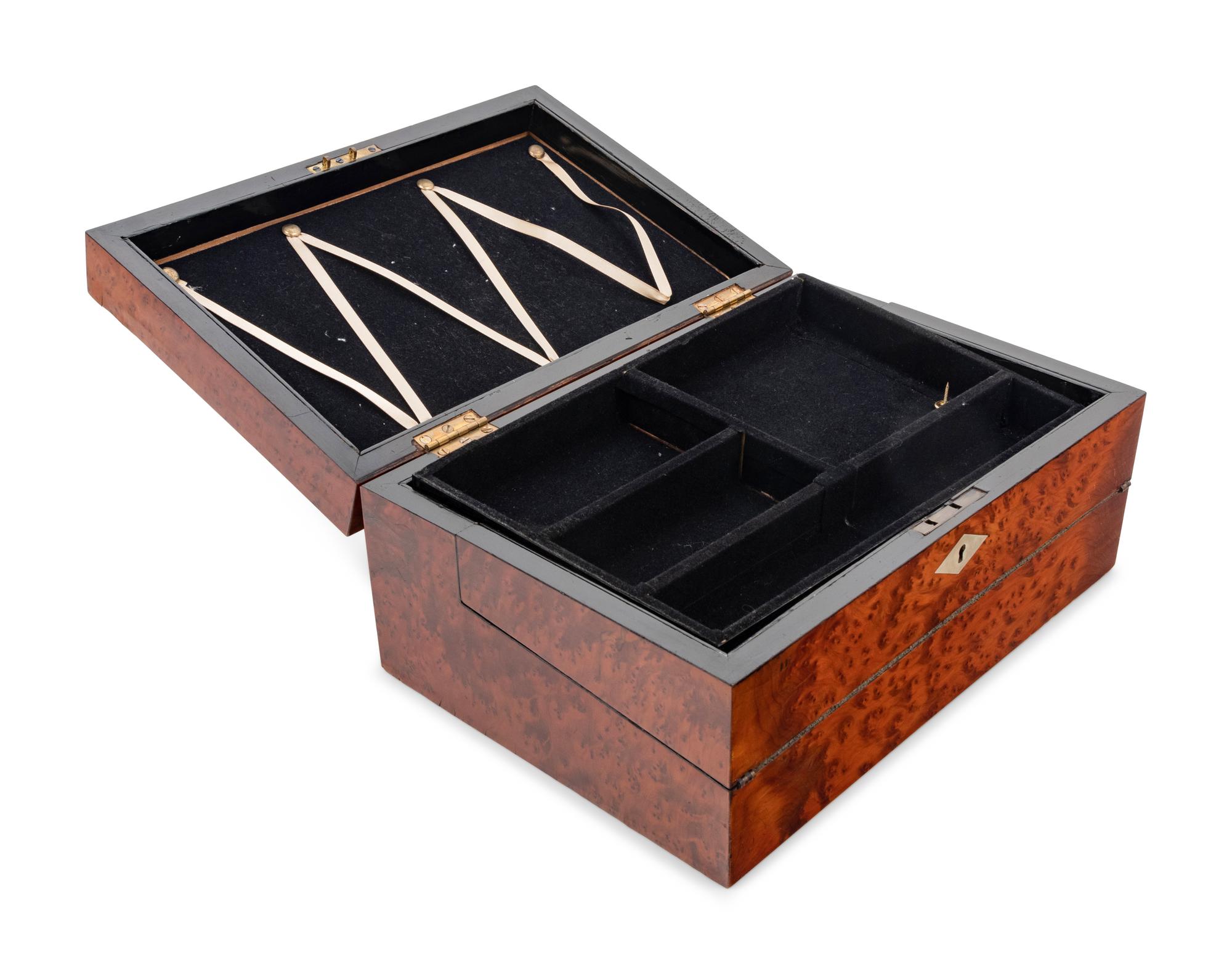 A Late Regency Mother-of-Pearl and Brass Inlaid Burlwood Writing Slope